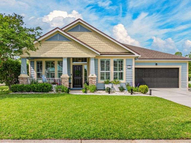 Welcome to one of St. Johns County’s best-kept secrets—where thoughtful design, comfort, and location come together beautifully. This move-in ready 4-bedroom, 2,206 sq ft home features an exceptional split floor plan that truly maximizes space and privacy, offering room for everyone while maintaining a seamless flow for everyday living. Designed with flexibility in mind, the home includes a versatile flex room that can easily serve as a formal dining room, parlor, home office, or even a 5th bedroom—adapting effortlessly to your lifestyle needs. Step inside to an open-concept layout highlighted by updated flooring, modern finishes, and a bright, airy feel throughout. The kitchen features granite countertops, updated appliances, and ample cabinetry, offering both style and plenty of space for cooking, entertaining, and gathering with ease.