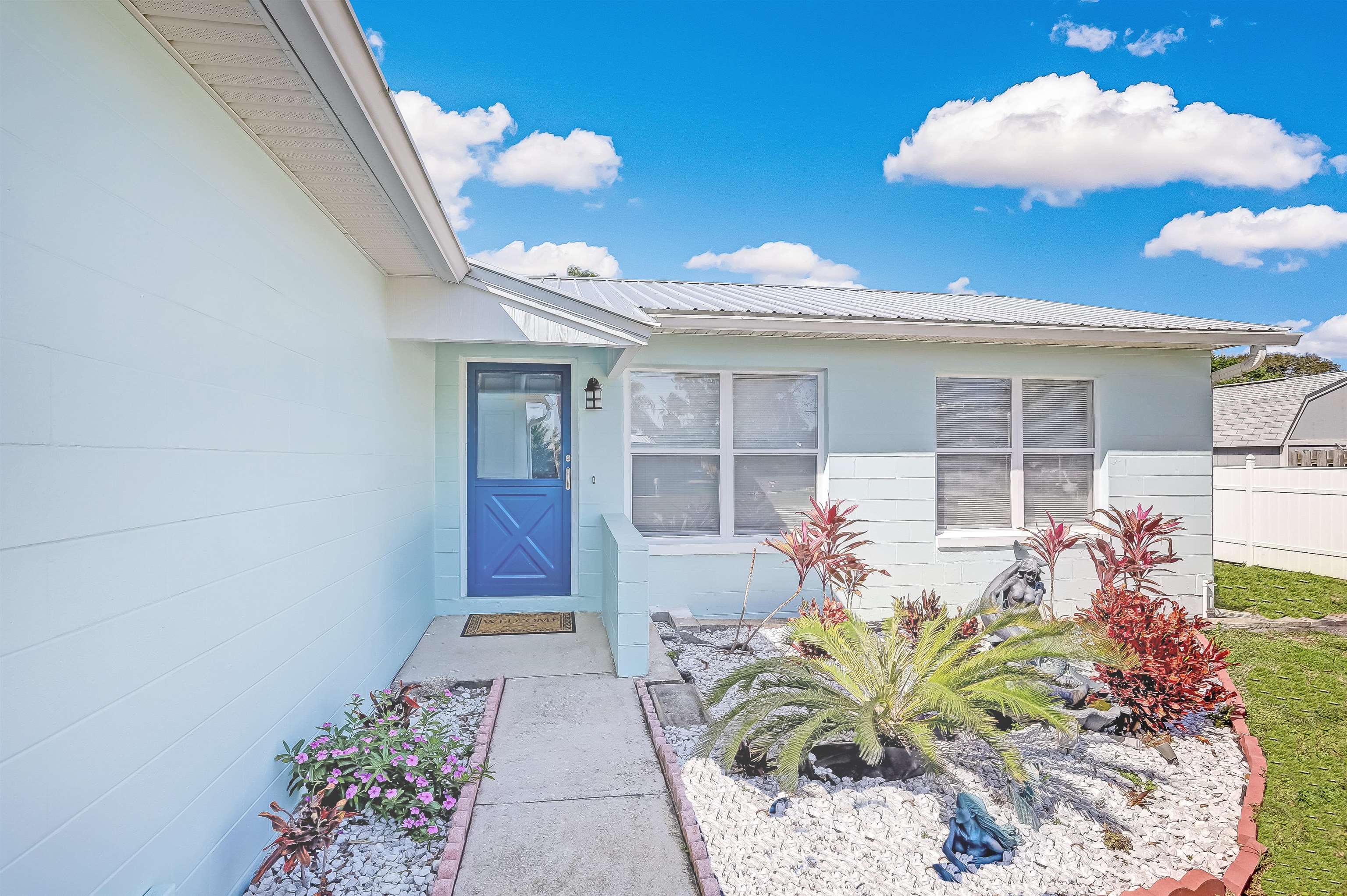 Experience the best of coastal Florida living at 260 Ventura Road in the highly sought-after Treasure Beach community of St. Augustine. This well-maintained 2-bedroom, 2-bathroom home with a 2-car garage is currently operating as a successful short-term vacation rental, offering excellent income potential for investors while also serving as an ideal primary residence or second home.  Situated in a canal-front community with easy access to the Intracoastal Waterway, this property is a boater's dream. The property features an over-the-water deck including ramp to a floating dock, making it easy to launch your next adventure. Enjoy a quick 15-minute boat ride to Matanzas Inlet for world-class fishing and ocean access, or cruise just 20 minutes north to historic downtown St. Augustine's waterfront restaurants, marinas, and attractions.