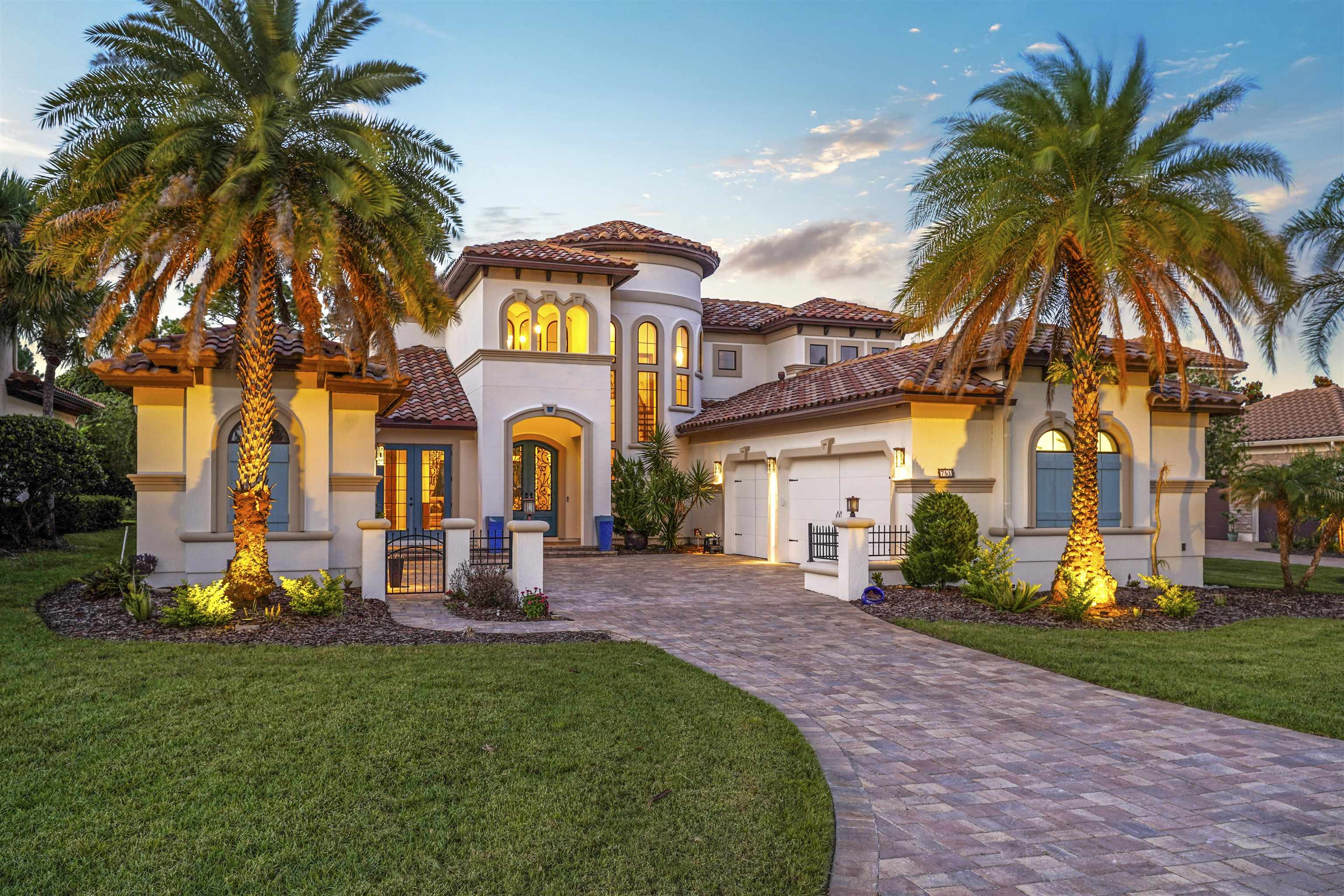 Mediterranean-inspired exterior with a terracotta tile roof and stucco finish Front Of Structure