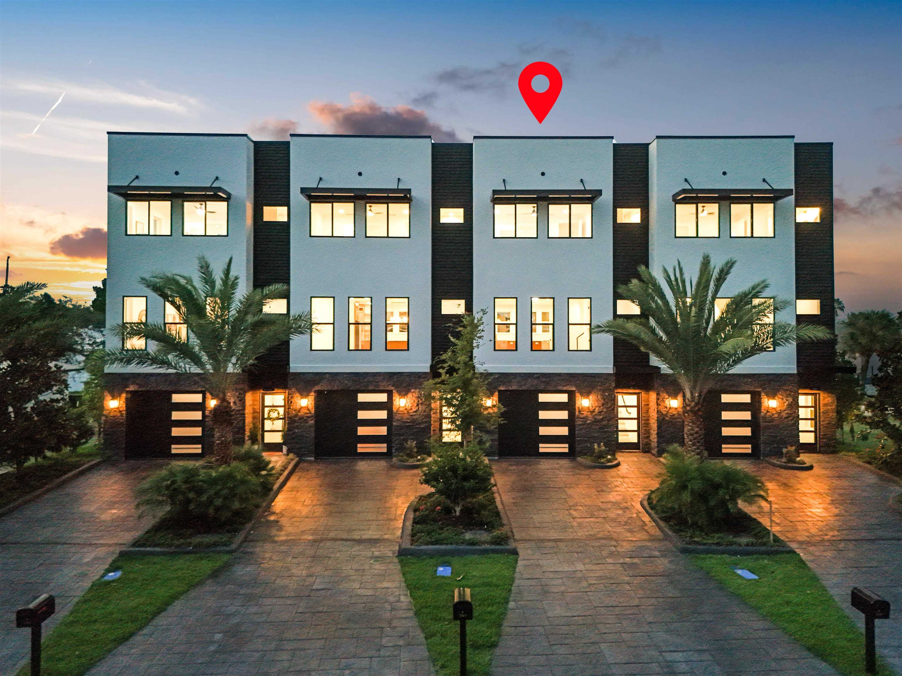 Contemporary townhome exteriors featuring clean lines and a monochromatic color palette Front Of Structure