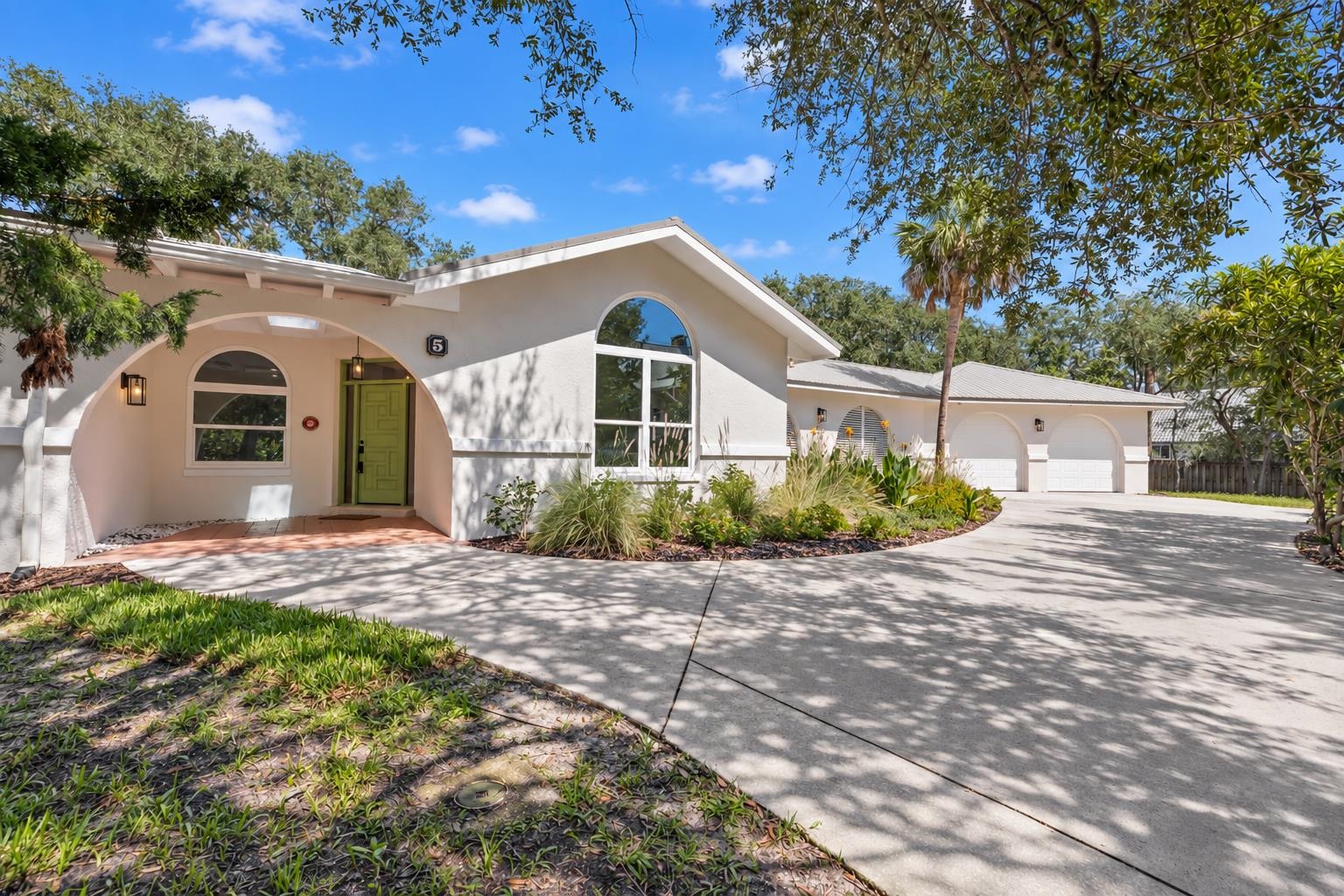 Amazing 3,158 sf single story POOL HOME on over a half acre and with no HOA and in flood zone X as an added bonus. This home immediately south of Sea Colony is a rare find allowing you to live in St. Augustine beach on an oversized lot. The screened pool, expansive lanai, and Florida room create the perfect indoor/outdoor living arrangement. The seller recently completed SUBSTANTIAL RENOVATIONS to the home so it is truly move in ready. Explore the possibility of adding a guest residence, pool house or detached garage in the abundant lot space to the left of the main residence. Take a short walk to the beach walkover at the end of Versaggi Rd. and land on the white sands of St. Augustine Beach. Open concept with 3 different living areas, a new kitchen, a huge lanai, 4 bedrooms and 3 fully renovated baths, this home offers flexibility and space! The chef’s kitchen boasts beautiful new cabinets and countertops finished with