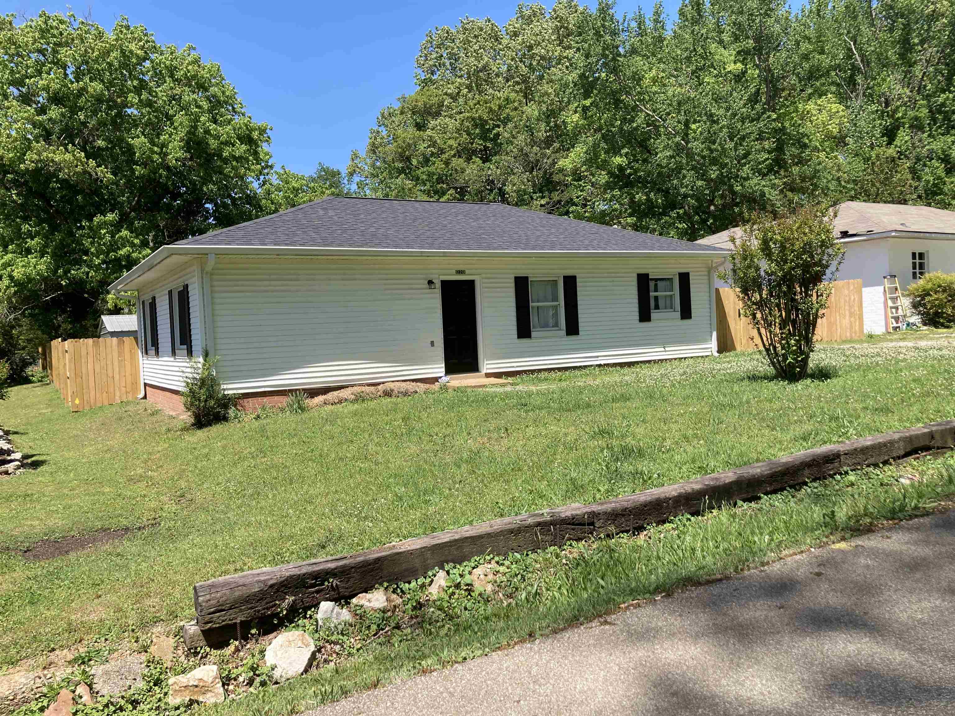 Enjoy the convenience of living close to shopping, schools, medical facilities, etc., in this 3BR, 1Bath home sitting on a 60X194 city lot.  This home has been remodeled on the inside, very tastefully done with new laminate hardwood floor covering throughout with the exception of the bathroom...which is tile.  New cabinets in the kitchen, new paint, etc....you will want to see the transformation. This home is on a slab, has a new roof , new gutters, new hot water heater, new dishwasher, has CH&A, plus has all public utilities: water, sewer, and natural gas.  The home also comes with a metal 2-car carport, and a storage building with electricity and a window unit air-conditioner.  The property has a nice, flat, shady yard. This property was under a Land Contract for several months. is now back on the market.  There has been a really nice privacy fence just recently installed on the property, as you will see with new pictures.   You won't have to worry about your pets.