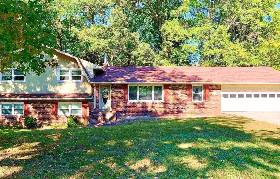 If you’ve been searching for space, privacy, and a solid home in a great location, this one deserves a closer look. Set on a wooded lot surrounded by mature trees, this brick split-level offers generous square footage and a functional floor plan designed for real life.  Multiple living areas allow for entertaining, hobbies, home offices, or extra guest space. The neighborhood is quiet and established, yet everyday essentials are only minutes away. A great opportunity for buyers looking for room to grow and a home they can personalize over time.