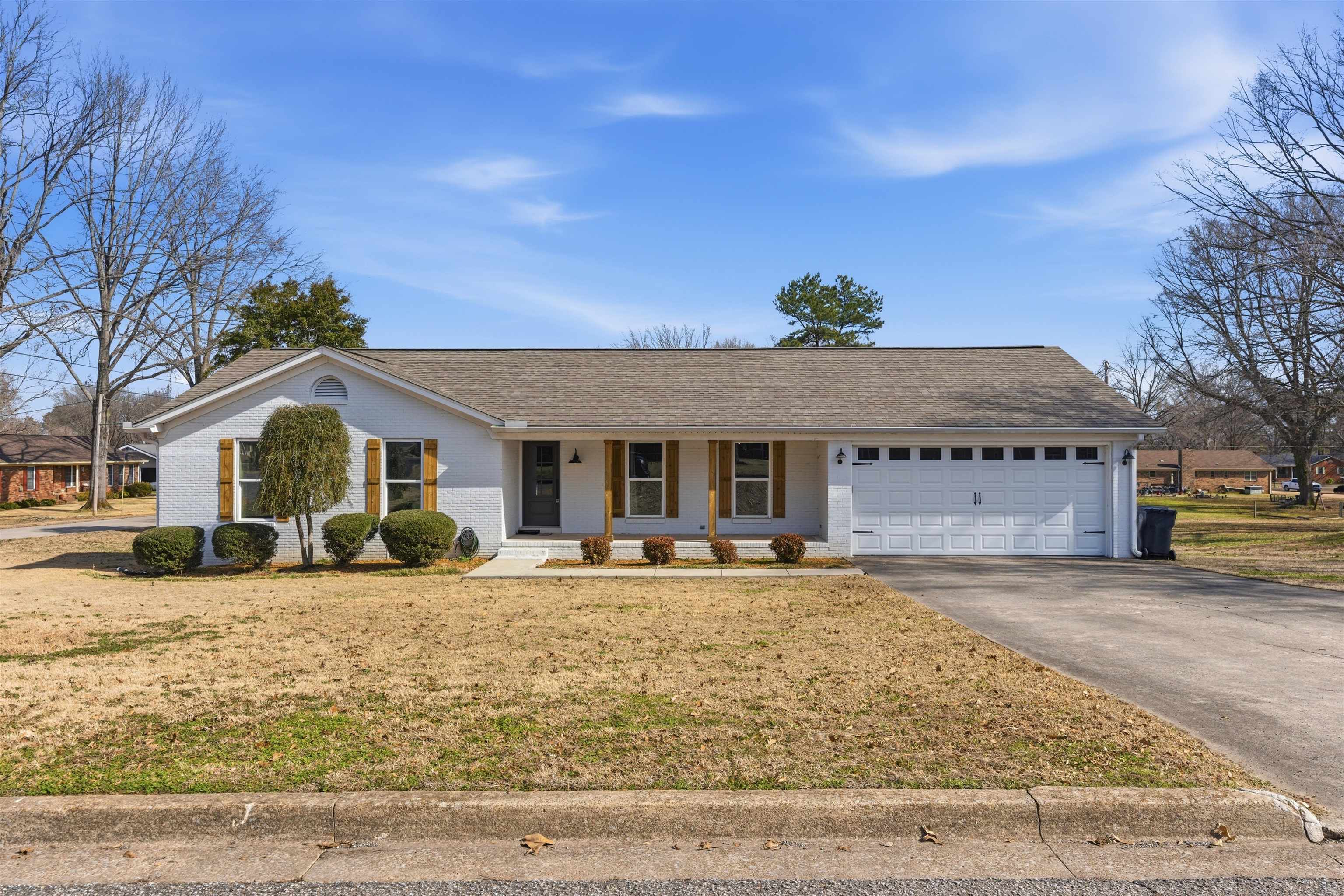 Beautifully renovated home located at 222 Barrett Street, Bolivar, TN.  This 1700+- square foot home has open living floor plan and includes 3 bedrooms, 2 baths with gorgeous updates throughout!  Renovations include kitchen, granite tops, new appliances, new baths, flooring throughout, paint, spacious utility room, outdoor kitchen area, inground pool!  Other features include a fenced yard, 2 car garage, and underground storm shelter!  Did we mention the great location?  Only 2 blocks from the country club and within 3 miles of most city amenities!  This home is move-in ready…a must-see property!