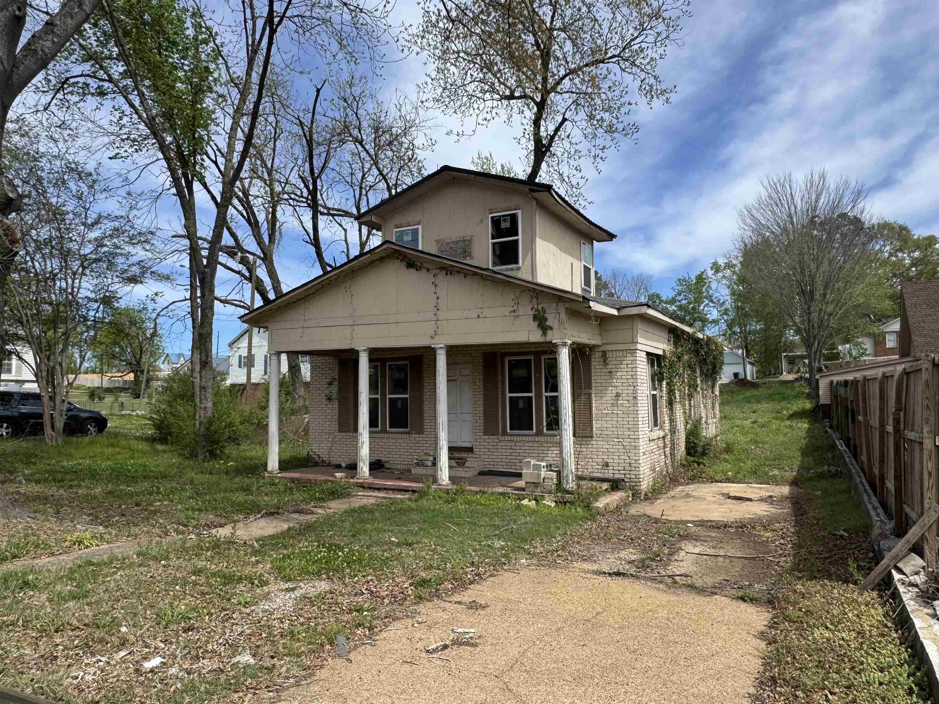INVESTOR'S DREAM in downtown Selmer! Layout and walls are studded to be an 3 bed/2 bath and needs your touch to finish the renovation. All floor joists are new. A framing permit has been pulled. All windows are brand new. Home sits on .4 in the heart of Selmer with 1441 sq ft of living space. city water, sewer, natural gas and high speed internet. Make this home adorable TODAY! Lot has road frontage on Warren Ave, as well. Call today! (Side note: one could build a home facing Warren Avenue to produce even more return on your investment.)