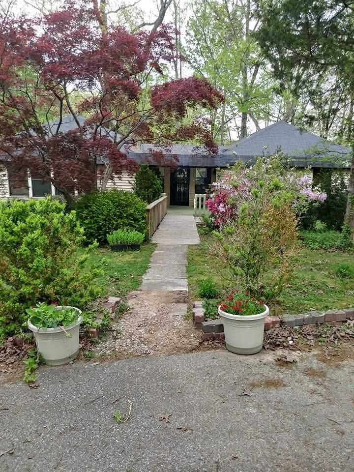 Experience the ultimate retreat in this enchanting 2 bedroom 2 bath cottage nestled on 9 plus acres of serenity, bursting with charm and character, requires minor cosmetic touches, being sold as is.