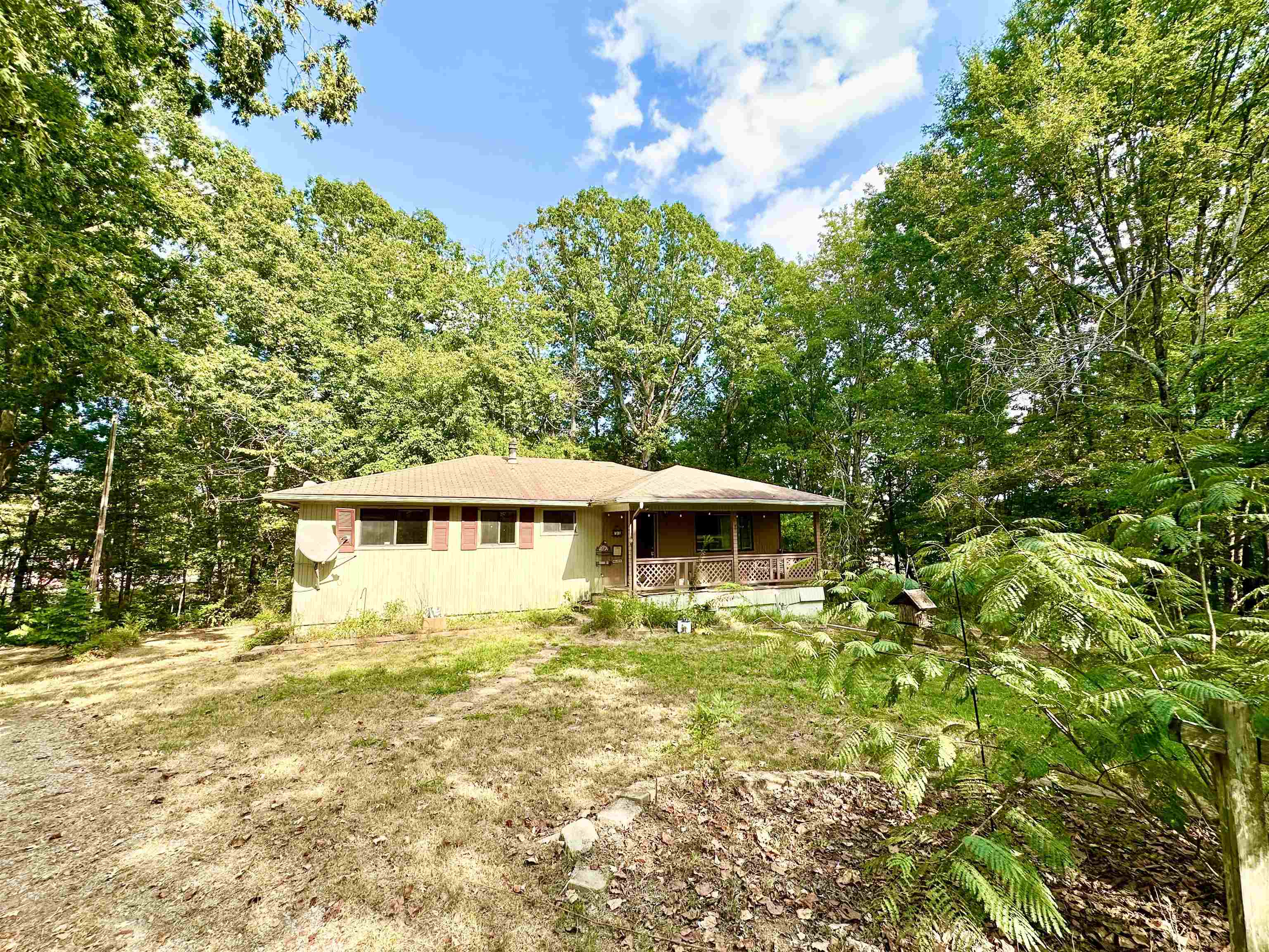 Charming 2bedroom, 2 bath home just 10 minutes from town, sitting on 1.51 acres. This property offers a great opportunity for those looking to add their own personal touch! It even has an unfinished basement! Bring your vision and some TLC to make it truly shine! With plenty of space inside and out, you’ll enjoy the convenience of being close to town while still having room to spread out and relax. Whether you’re a buyer or investor looking for a project, this home has great potential!