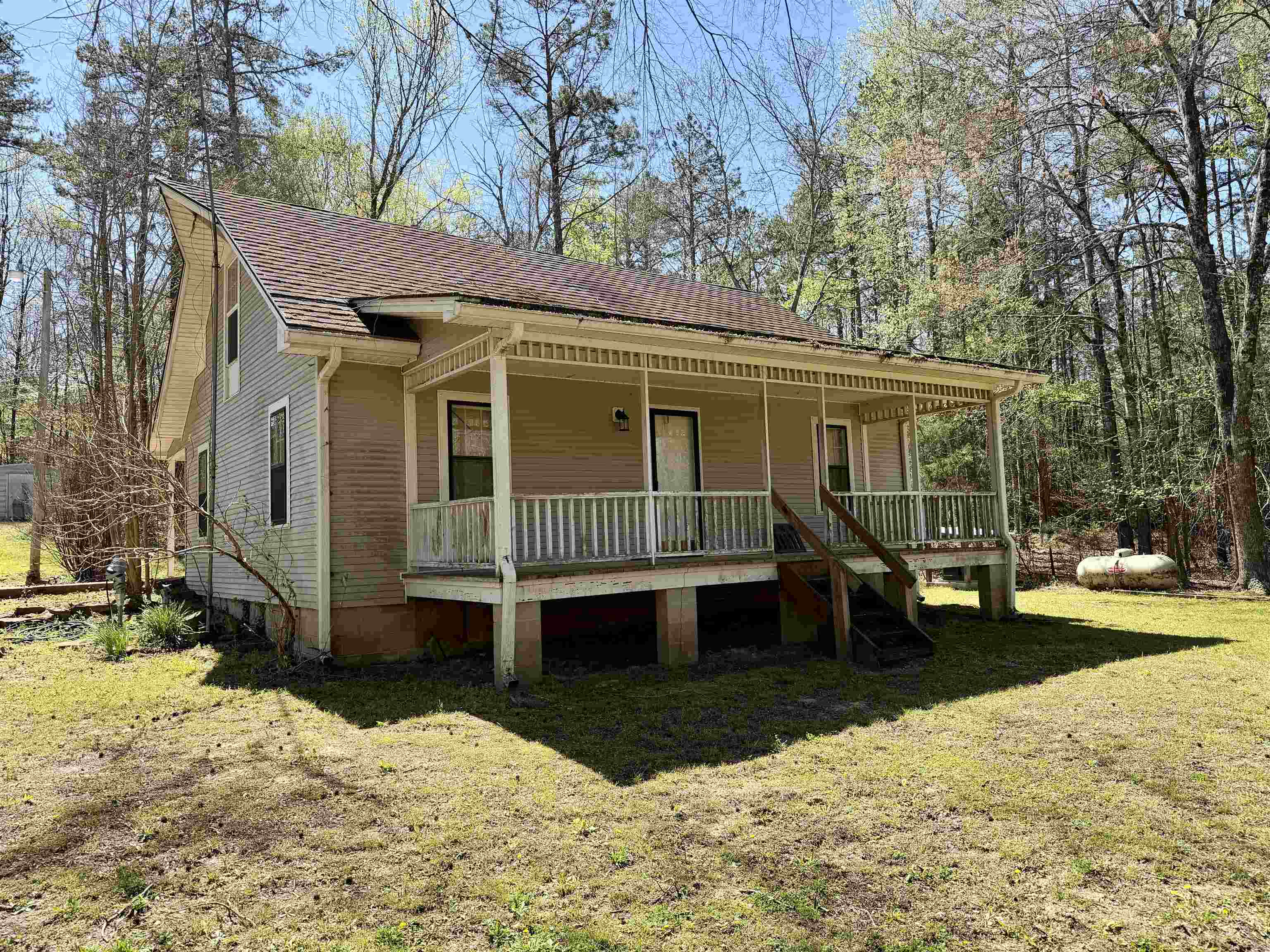 !!AUCTION!! Up for auction, Saturday, April 18th is this cozy 3 bedroom, 1 bathroom home, beautifully placed on over 3 acres overlooking a private pond! With some TLC, this home will shine. But that's not all - this incredible property also features a 24x60 heated and cooled shop, complete with a large workshop area, office space, and full bathroom. Two additional storage buildings provide ample space for tools, equipment, and more.  Whether you're looking for a peaceful retreat or a functional workspace, this property has it all! Come out and bid in person starting at 9 am. Real estate will sell promptly at 11am or bid online at Actionrealtyauction.hibid.com.