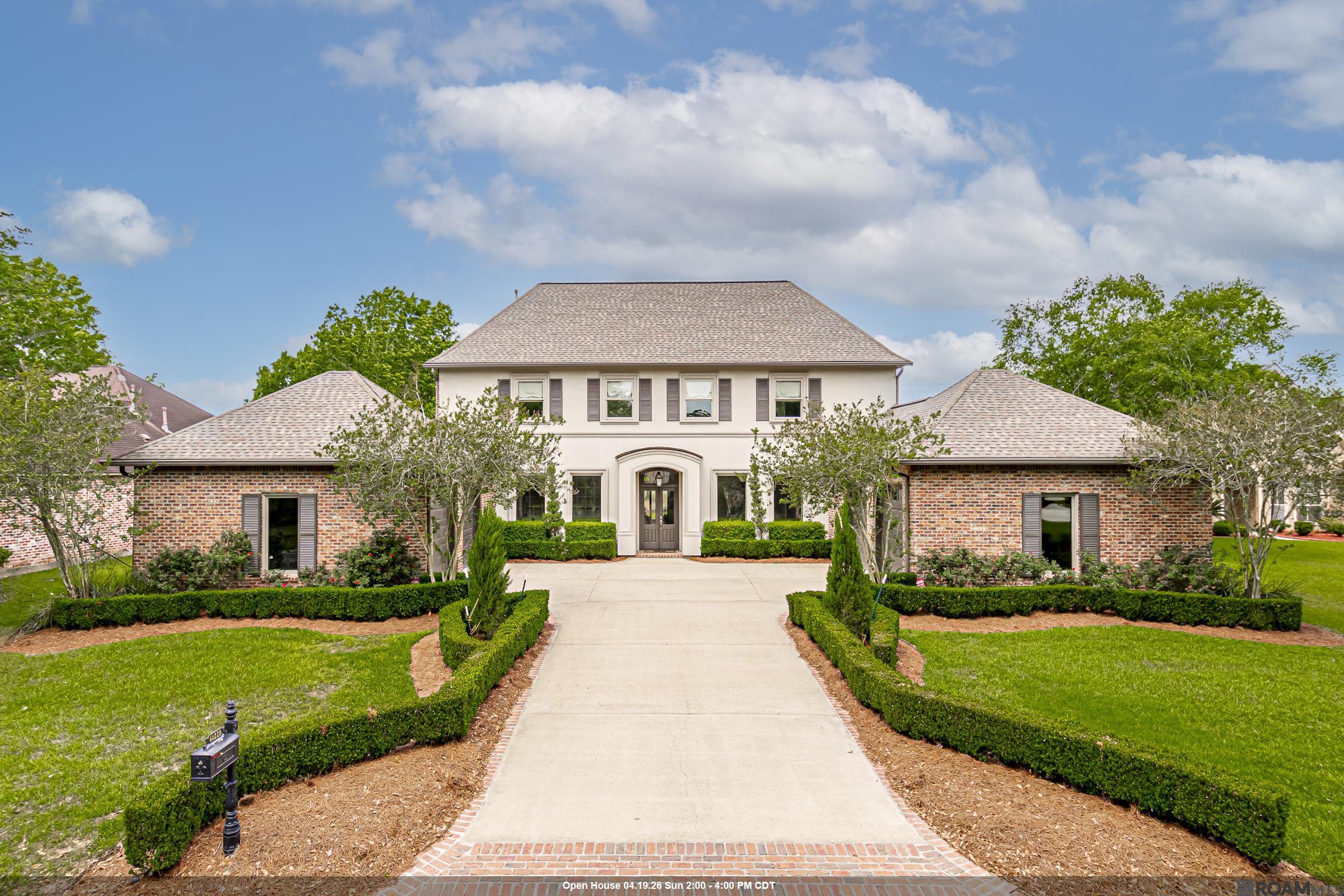 Experience the essence of refined living in this stunning 5 bedroom,  5.5 bathroom home, ideally situated within the welcoming Pelican Point Golf Course community. Spanning 4,474 square feet on a .36-acre lot, this move-in-ready sanctuary invites you in with abundant natural light, thanks to oversized windows that frame picturesque views of the lush backyard, tranquil pond, and the well-manicured golf course. Upon entering, you'll appreciate the inviting atmosphere of the bright chef’s kitchen, featuring elegant shaker-style cabinets and sleek subway tile. Equipped with top-of-the-line Thermador professional appliances and exquisite marble countertops, this space seamlessly blends functionality with beauty. The thoughtful design extends into the laundry room, walk-in en suite, and all five-and-a-half bathrooms, ensuring every detail is both practical and aesthetically pleasing. The primary en suite offers a comforting retreat, showcasing vaulted ceilings and a charming barn door that leads to sliding glass doors opening to the backyard oasis. Here, you can unwind in a spa-like atmosphere complete with an oversized Jacuzzi tub, a custom shower with dual heads and a bench, and a spacious walk-in closet. For those who enjoy hosting, the outdoor kitchen is a delightful space, equipped with DCS appliances and an eight-person high-top bar. The granite countertop, paired with custom halogen lighting and dimmers, creates a warm ambiance, while a built-in stereo and theater system, along with wired speakers throughout the home and outdoor kitchen, enhance every gathering. This residence also boasts exceptional curb appeal, featuring thoughtfully designed formal landscaping and a rare oversized four-car garage with a workshop area. Picture a lifestyle where comfort meets sophistication, welcoming professionals from all walks of life, including local residents and those relocating to the area.