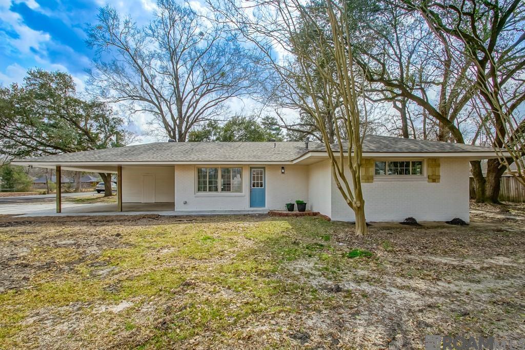 Welcome home to this fully remodeled gem in the heart of Central, located in a highly desired area and zoned for Central Community Schools. Sitting on a corner lot in Flood Zone X, this home blends timeless charm with modern upgrades—move-in ready from top to bottom.  Step inside to find brick floors paired with laminate wood flooring, creating warmth and durability throughout. The open, updated kitchen features quartz countertops, a gas cooktop, stainless steel appliances, and generous storage, including a walk-in pantry. A walk-in laundry room adds everyday convenience.  The spacious primary suite offers a true retreat with a double vanity and two closets. Two additional bedrooms and a second full bath provide flexibility for family, guests, or a home office.  Recent upgrades include a new roof, new paint, and a complete remodel, giving peace of mind and modern style. Conveniently located just 20 minutes from the interstate, this home offers easy access while maintaining a quiet, community feel.