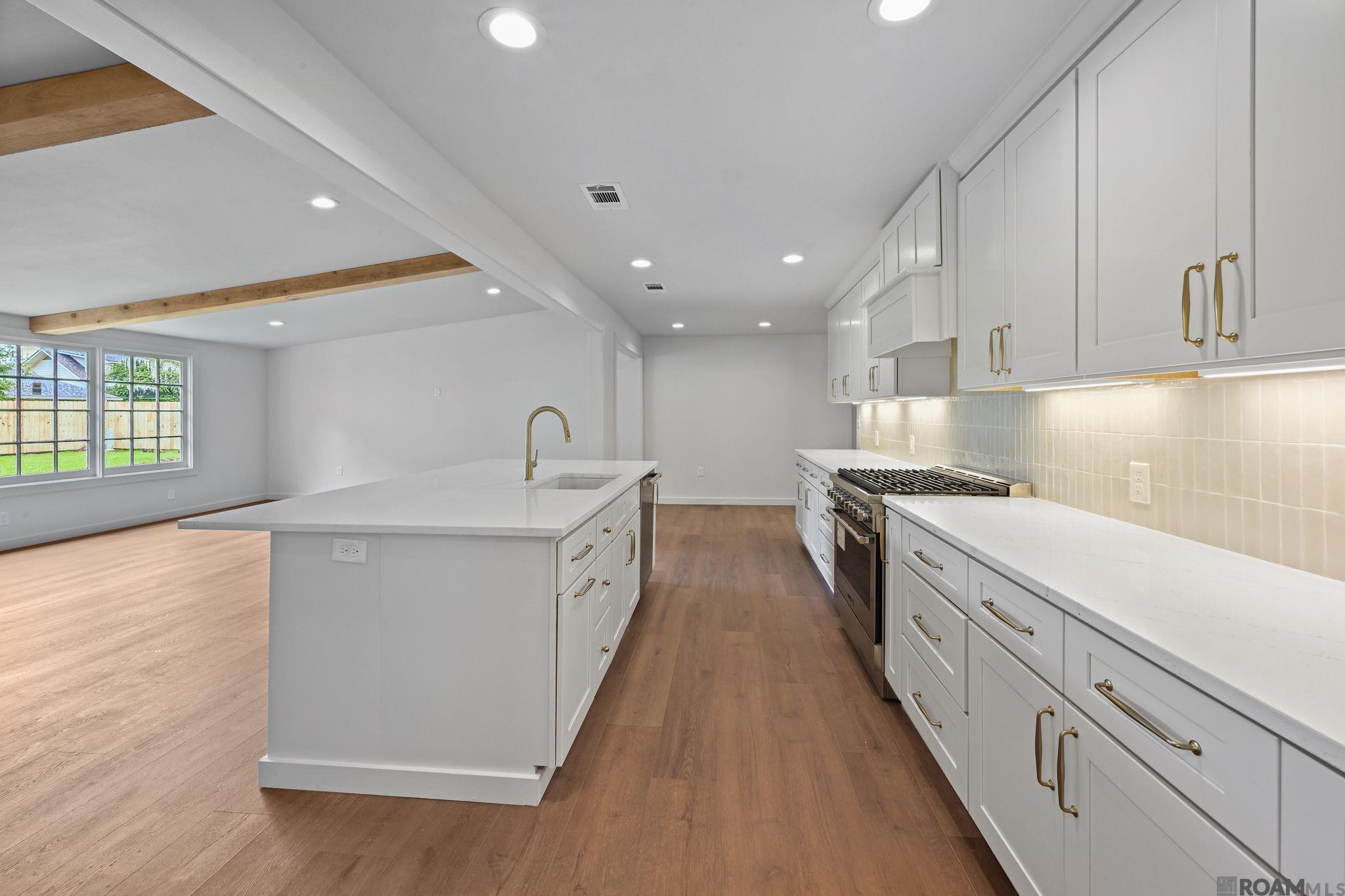 OPEN HOUSE Sunday 09/13 from 2-4pm! Prepare to be impressed by this completely transformed 3,200+ square foot showplace where every detail has been thoughtfully reimagined and upgraded. Nestled in one of Baton Rouge's most desirable subdivisions, Tara, offering 5 spacious bedrooms and 4 full baths, this stunning home combines timeless style with modern functionality in a way that is rarely found. Step inside to discover an open, highly functional floor plan designed for today's lifestyle, featuring custom cabinetry, designer finishes, and beautiful craftsmanship throughout. The expansive living spaces flow seamlessly together, creating the perfect setting for both everyday living and entertaining on any scale. No expense was spared in this top-to-bottom renovation. Practically everything has been replaced, including all windows, roof, mechanical systems, appliances, fixtures, and more, providing peace of mind for years to come. Every room showcases fresh, updated finishes that blend sophistication with comfort. Outside, you'll find a brand-new wood privacy fence creating a secure and inviting backyard retreat with plenty of space for family gatherings, pets, play, or future outdoor amenities. This is far more than a home renovation—it's a complete transformation. With over 3,200 square feet of beautifully updated living space, 5 bedrooms, 4 full baths, and every major improvement already completed, this move-in ready property offers the perfect combination of luxury, convenience, and value.