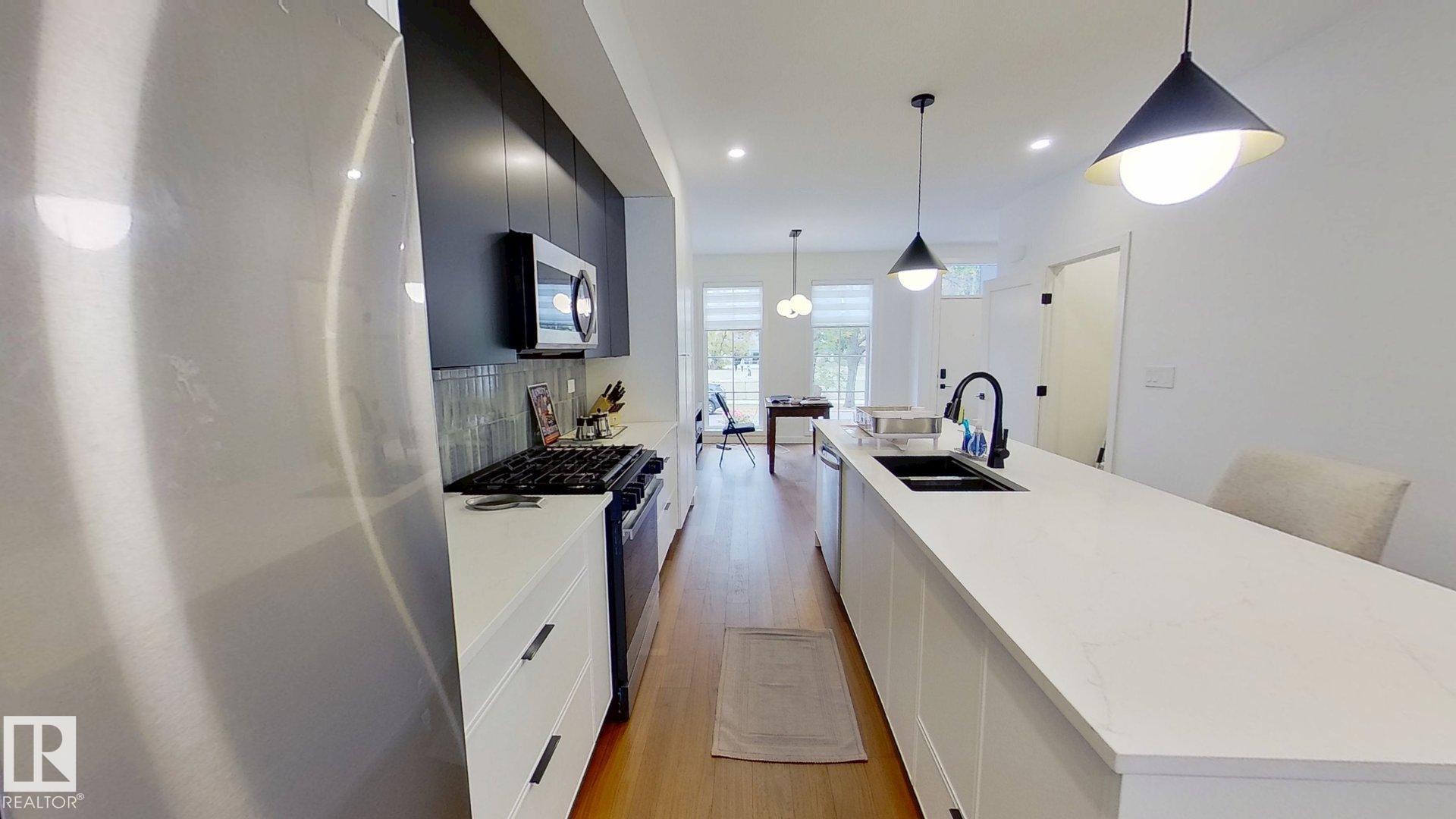 Photo 4 at 11308 128 Street NW, Inglewood, Edmonton