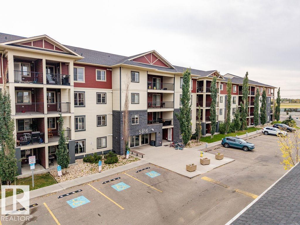 This is it!  This bright, spacious, south-facing 968 sq ft corner unit has a balcony for relaxing evenings with friends.  With an open-concept layout, the open den can be used as a home office or exercise space, granite countertops, stainless steel appliances, a walk-through closet with a private ensuite, in-suite laundry, and titled heated underground parking. Fresh paint and new carpet throughout. Unbeatable location steps to Currents of Windermere, transit, ravine trails, and quick access to Anthony Henday. Move-in ready and priced to sell?this is the one buyers have been waiting for?exceptional value, excellent layout, and ready for quick possession.