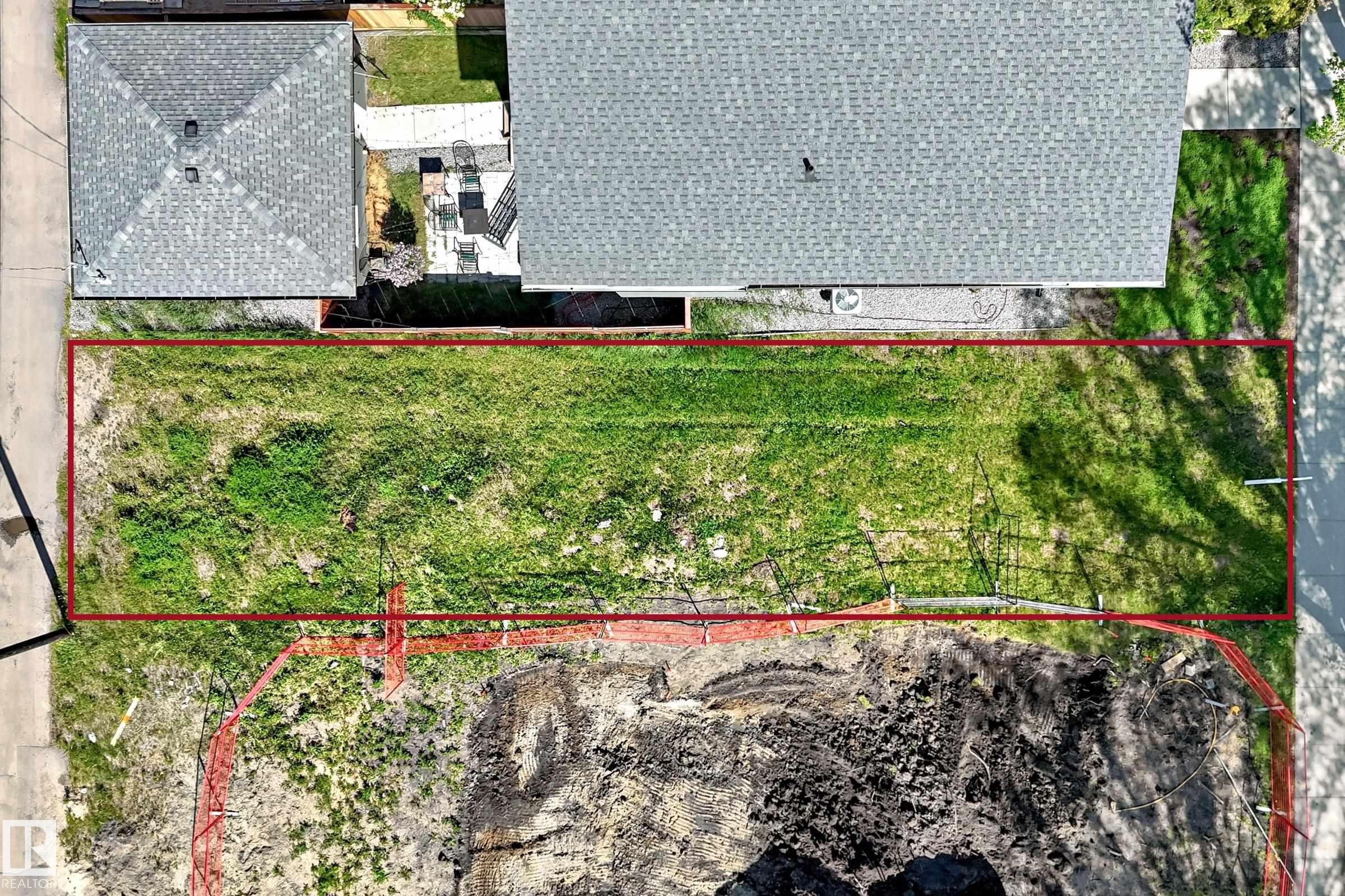 PRIME INFILL DEVELOPMENT LOT in the coveted neighbourhood of PARKVIEW! Secure a rare development opportunity in one of West Edmonton?s premier mature neighborhoods. This flat, rectangular parcel measures 8.53 meters wide by 33.51 meters deep (28.0' X 110.0') and features REAR LANE ACCESS, making it highly optimal for premium detached infill construction.The property is situated in a high-demand, stable market surrounded by high-end new builds. The location offers excellent long-term asset value due to its proximity to key infrastructure and amenities. It provides direct access to MACKENZIE RAVINE and the North Saskatchewan River Valley trail system, and sits within walking distance of top-rated schools and local commercial plazas. Commute times are minimal, with direct transit and road connectivity to Downtown Edmonton, the University of Alberta, and major medical centers.