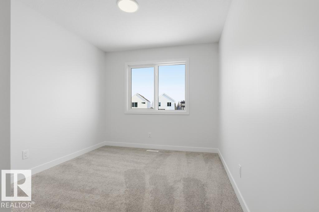 Photo 11 at 9115 Elves Loop NW, Edgemont, Edmonton