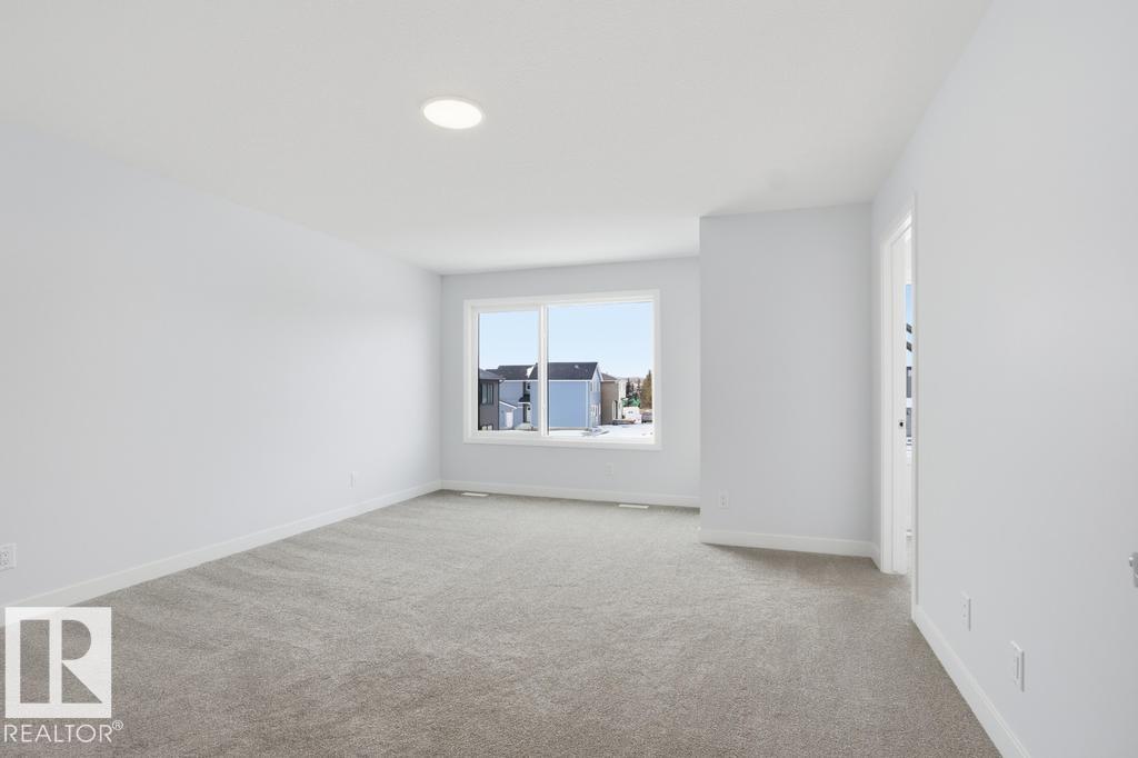 Photo 6 at 9115 Elves Loop NW, Edgemont, Edmonton