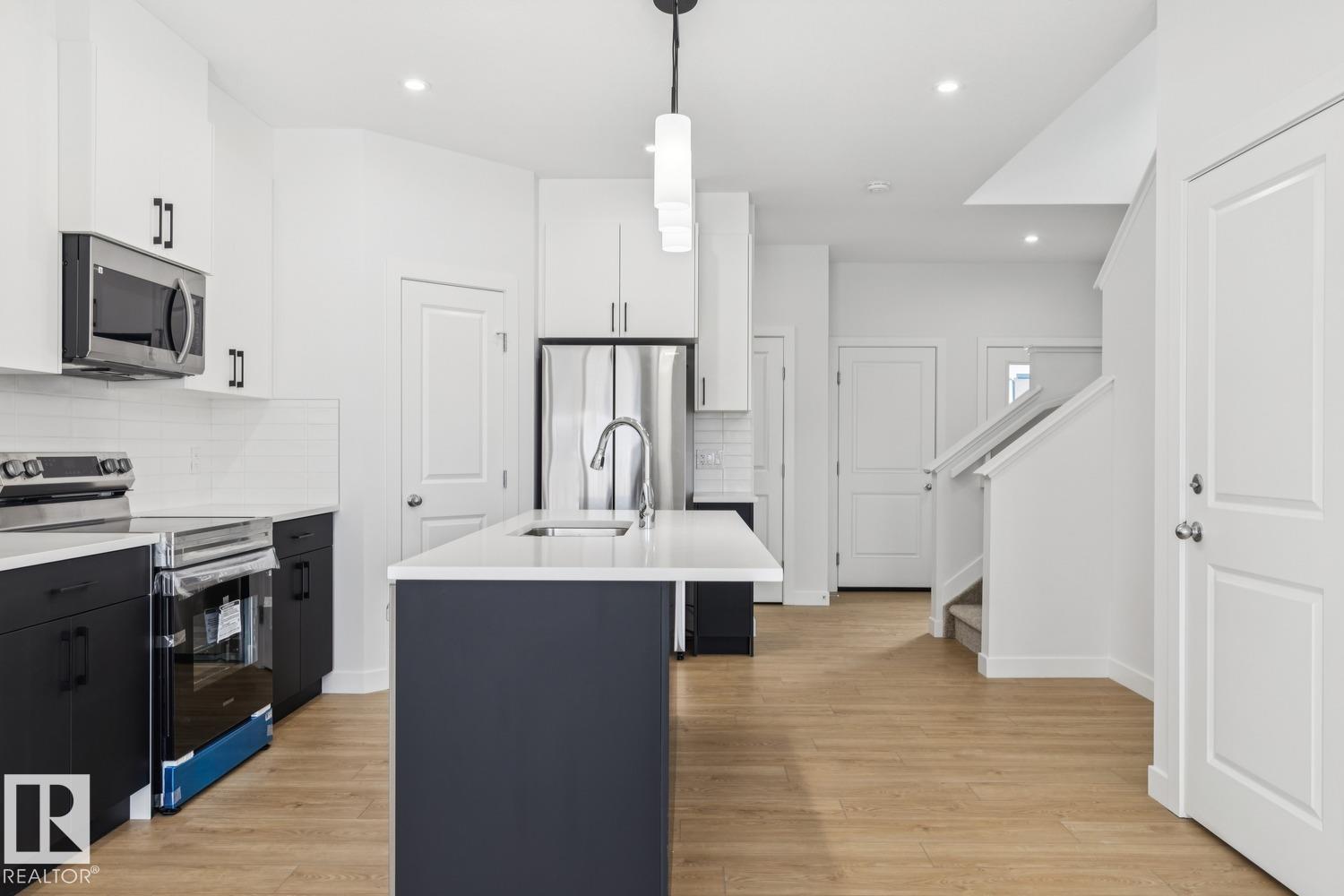 Photo 8 at 411 26 Street SW, Alces, Edmonton