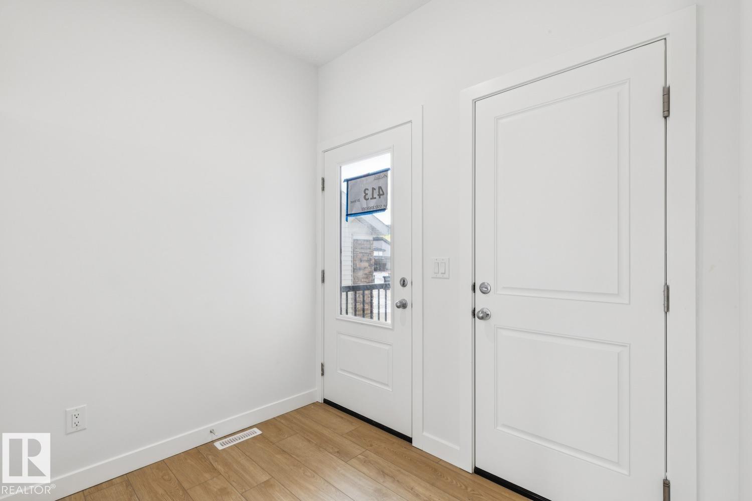 Photo 2 at 413 26 Street SW, Alces, Edmonton