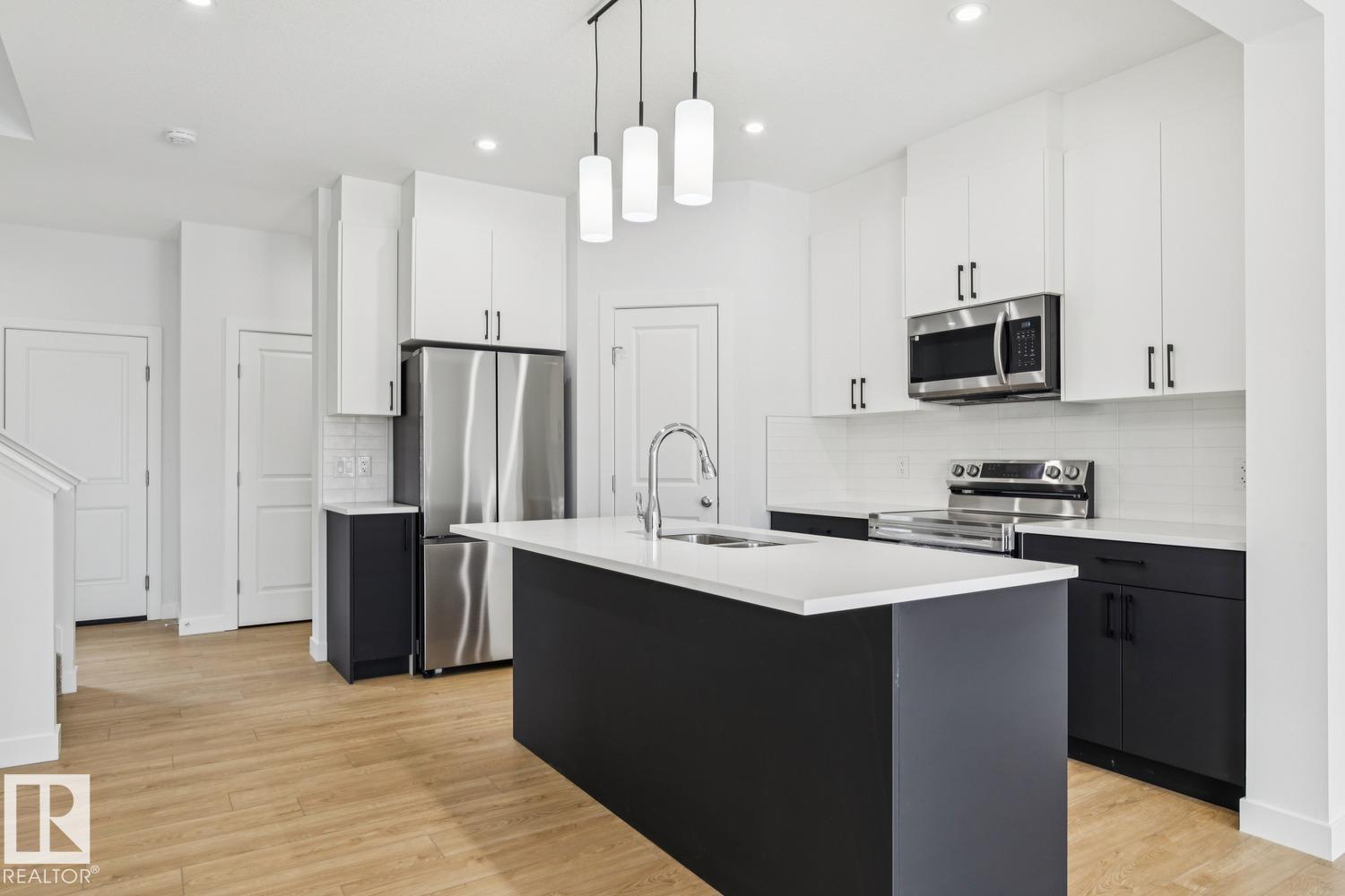 Photo 9 at 413 26 Street SW, Alces, Edmonton