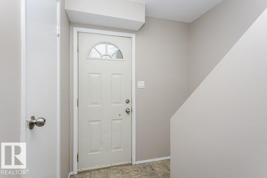 Photo 7 at 130 Dickinsfield Court NW, Evansdale, Edmonton