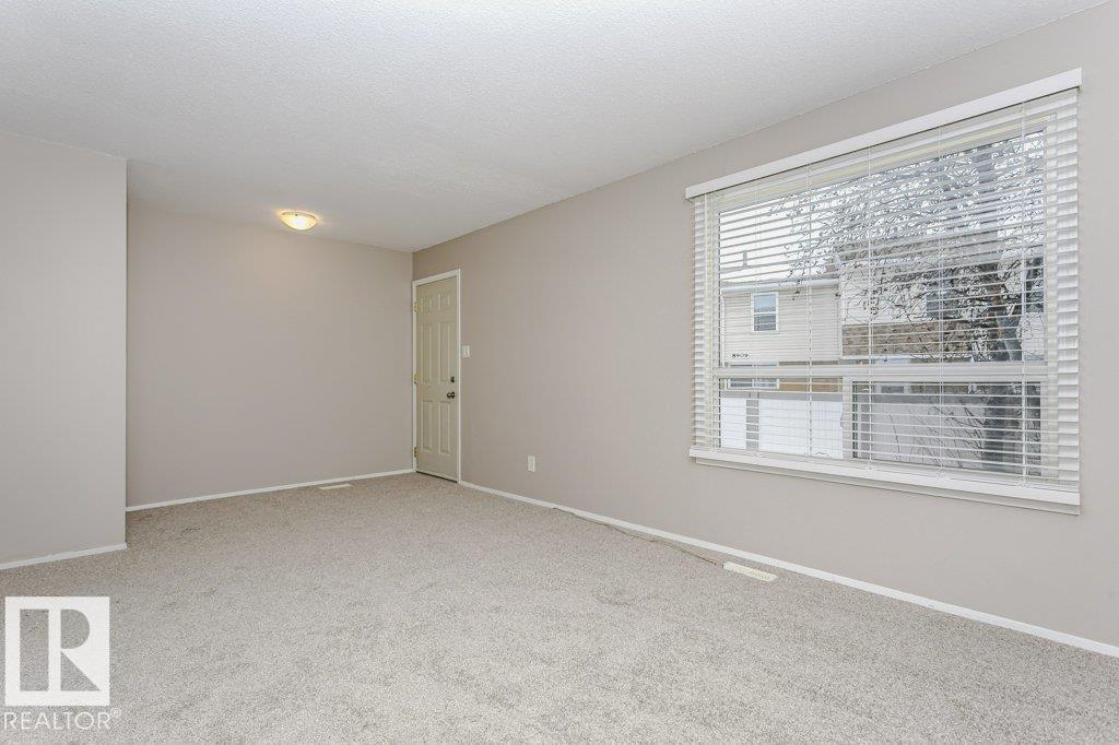 Photo 9 at 130 Dickinsfield Court NW, Evansdale, Edmonton