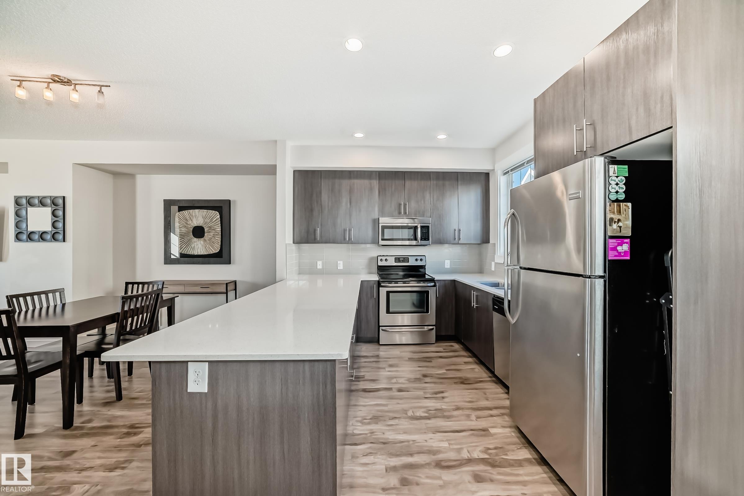 Photo 3 at 60 - 903 Crystallina Nera Way NW, Crystallina Nera West, Edmonton