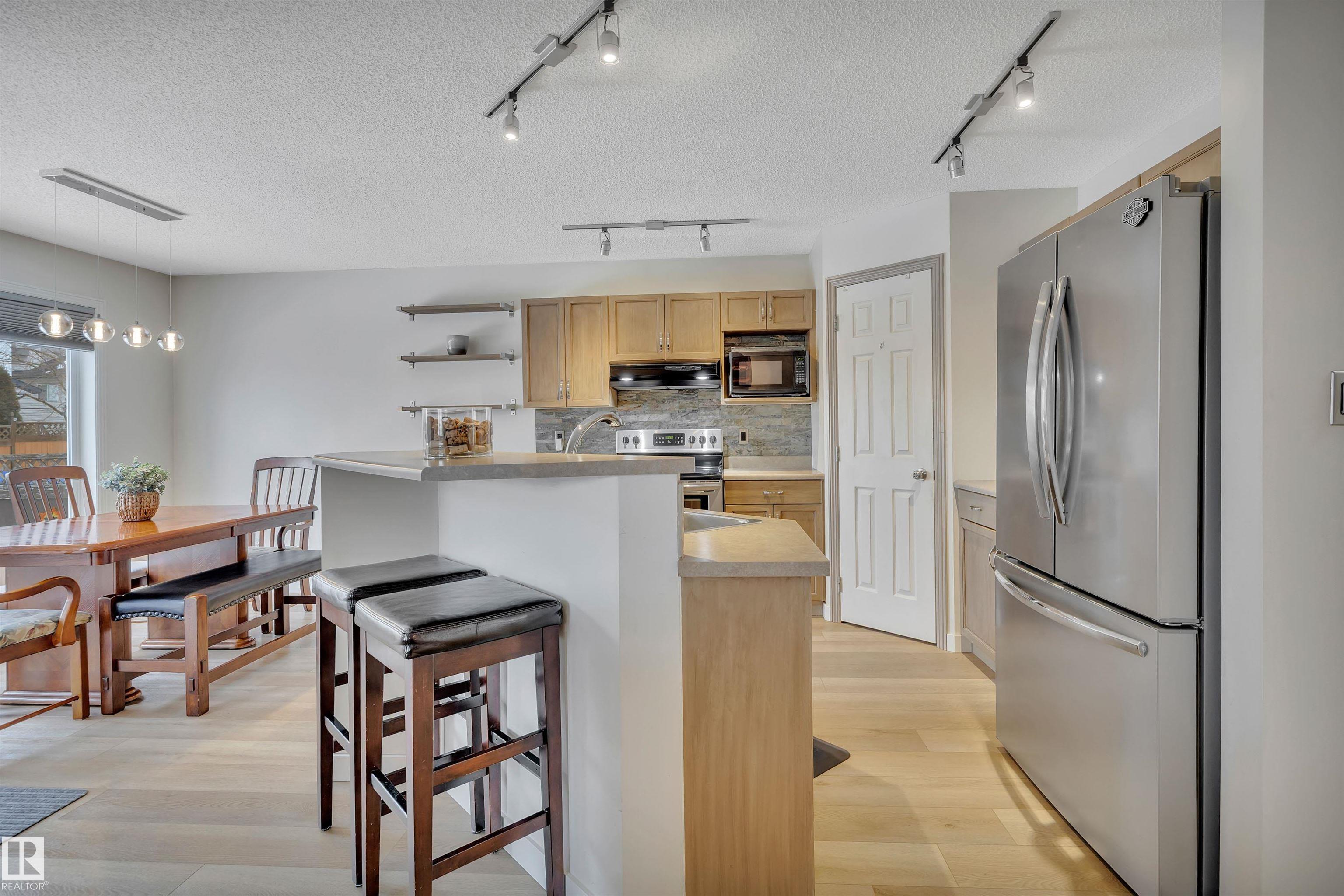 Photo 12 at 3791 21 Street N NW, Wild Rose, Edmonton