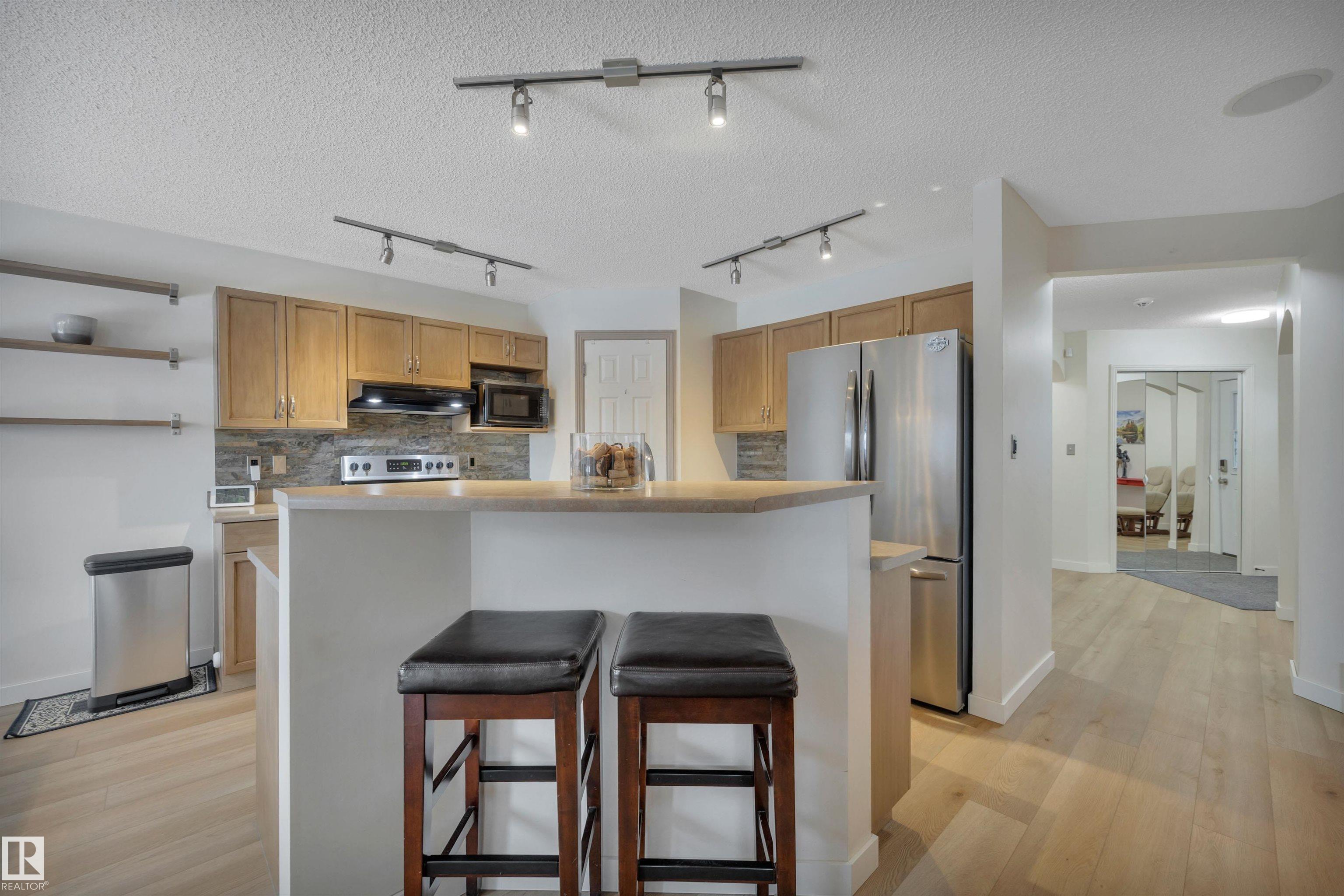 Photo 13 at 3791 21 Street N NW, Wild Rose, Edmonton