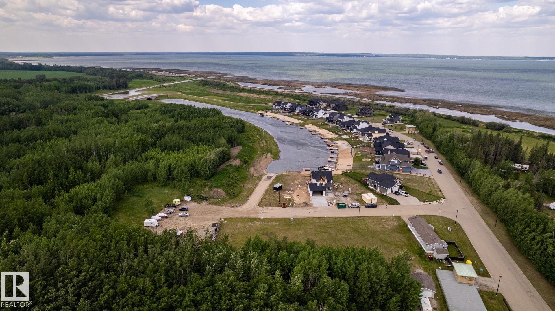 Photo 24 at 209 - 3410 Ste. Anne Trail, Windmill Harbour, Rural Lac Ste. Anne County