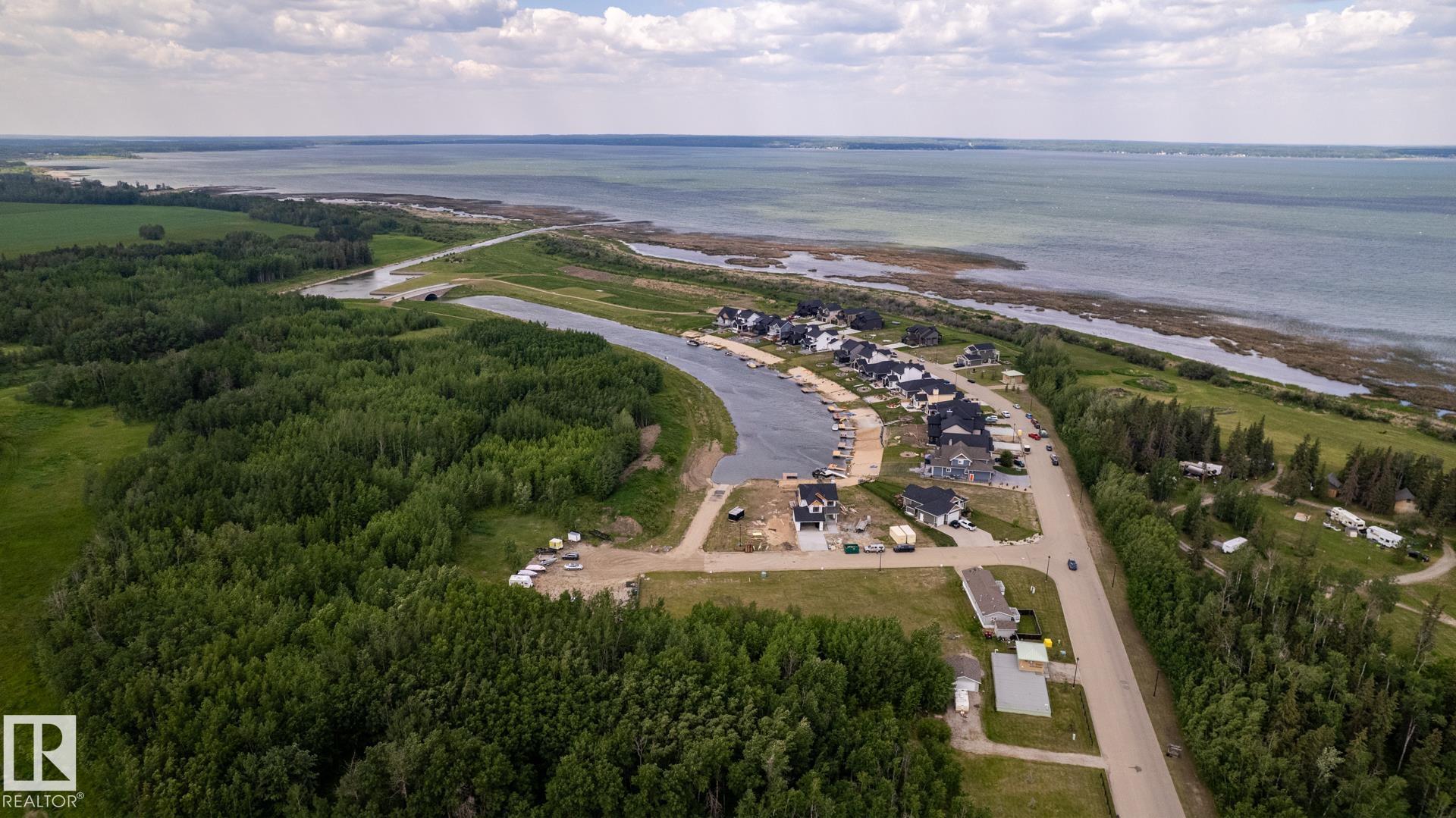 Photo 25 at 209 - 3410 Ste. Anne Trail, Windmill Harbour, Rural Lac Ste. Anne County