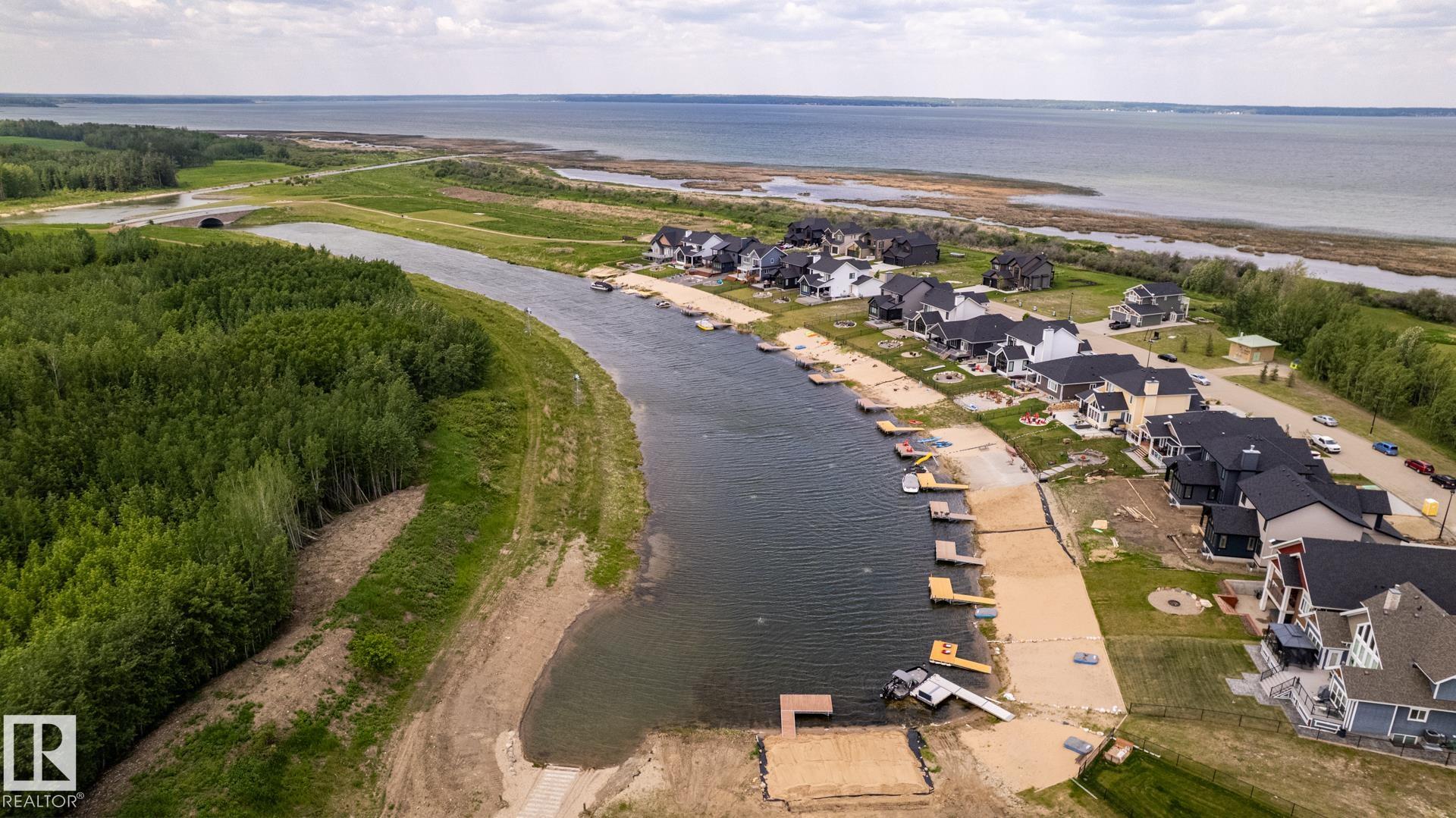 Photo 34 at 209 - 3410 Ste. Anne Trail, Windmill Harbour, Rural Lac Ste. Anne County