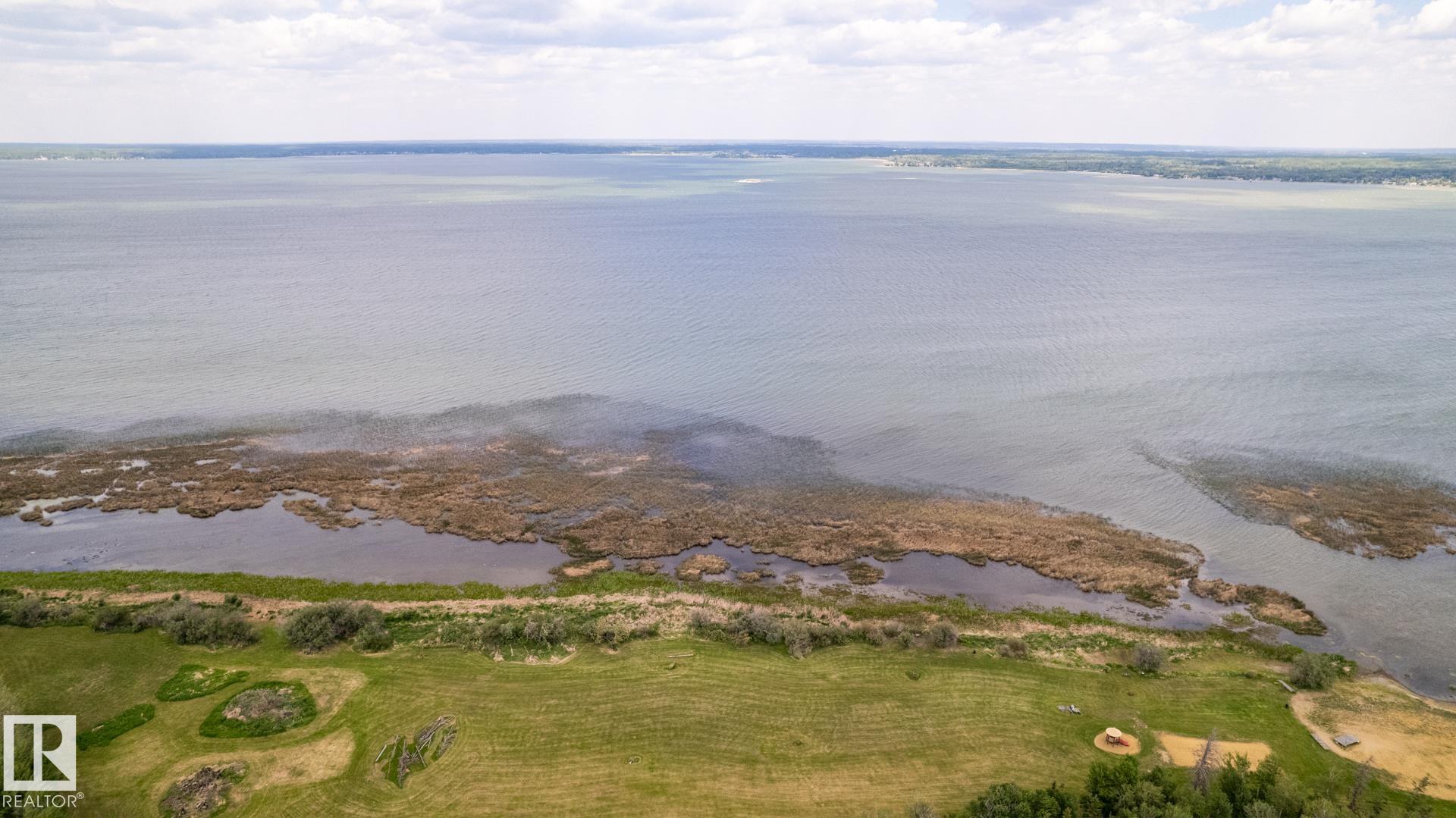 Photo 39 at 209 - 3410 Ste. Anne Trail, Windmill Harbour, Rural Lac Ste. Anne County