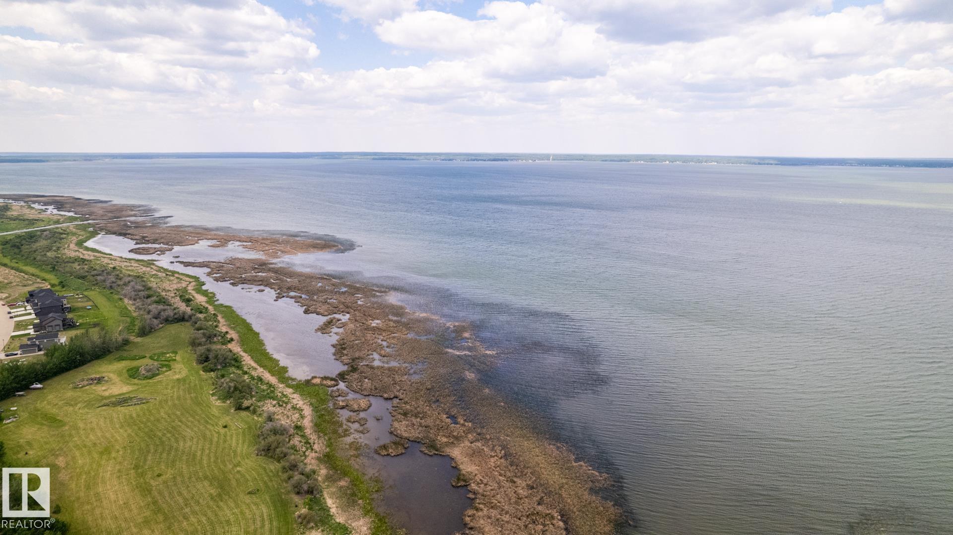 Photo 42 at 209 - 3410 Ste. Anne Trail, Windmill Harbour, Rural Lac Ste. Anne County