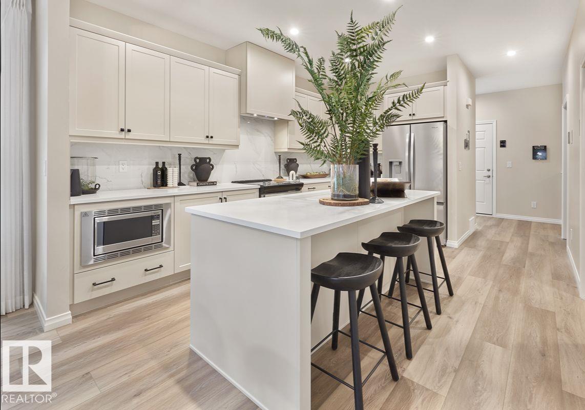 Photo 2 at 12842 213a Street NW, Trumpeter Area, Edmonton