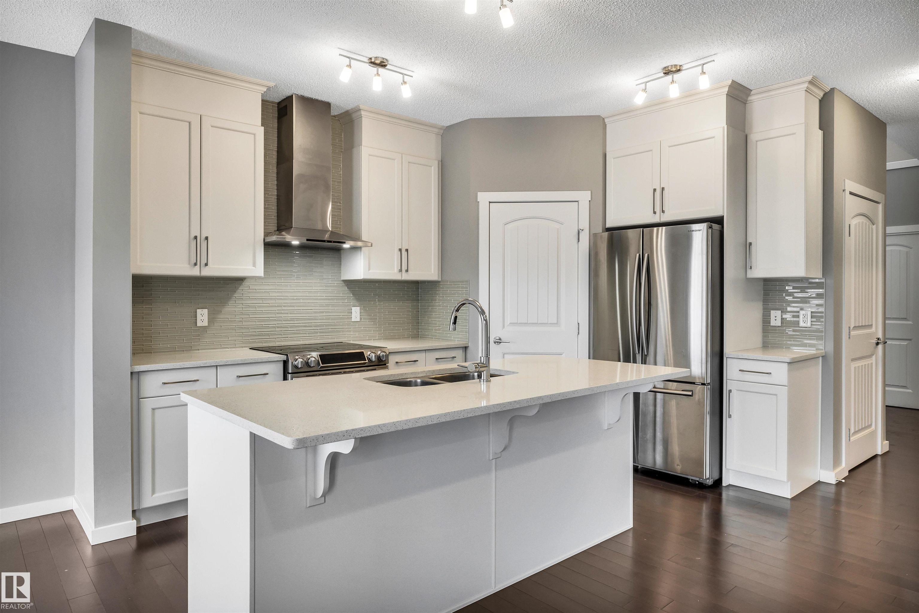 Photo 3 at 4442 5a Street NW, Maple Crest, Edmonton