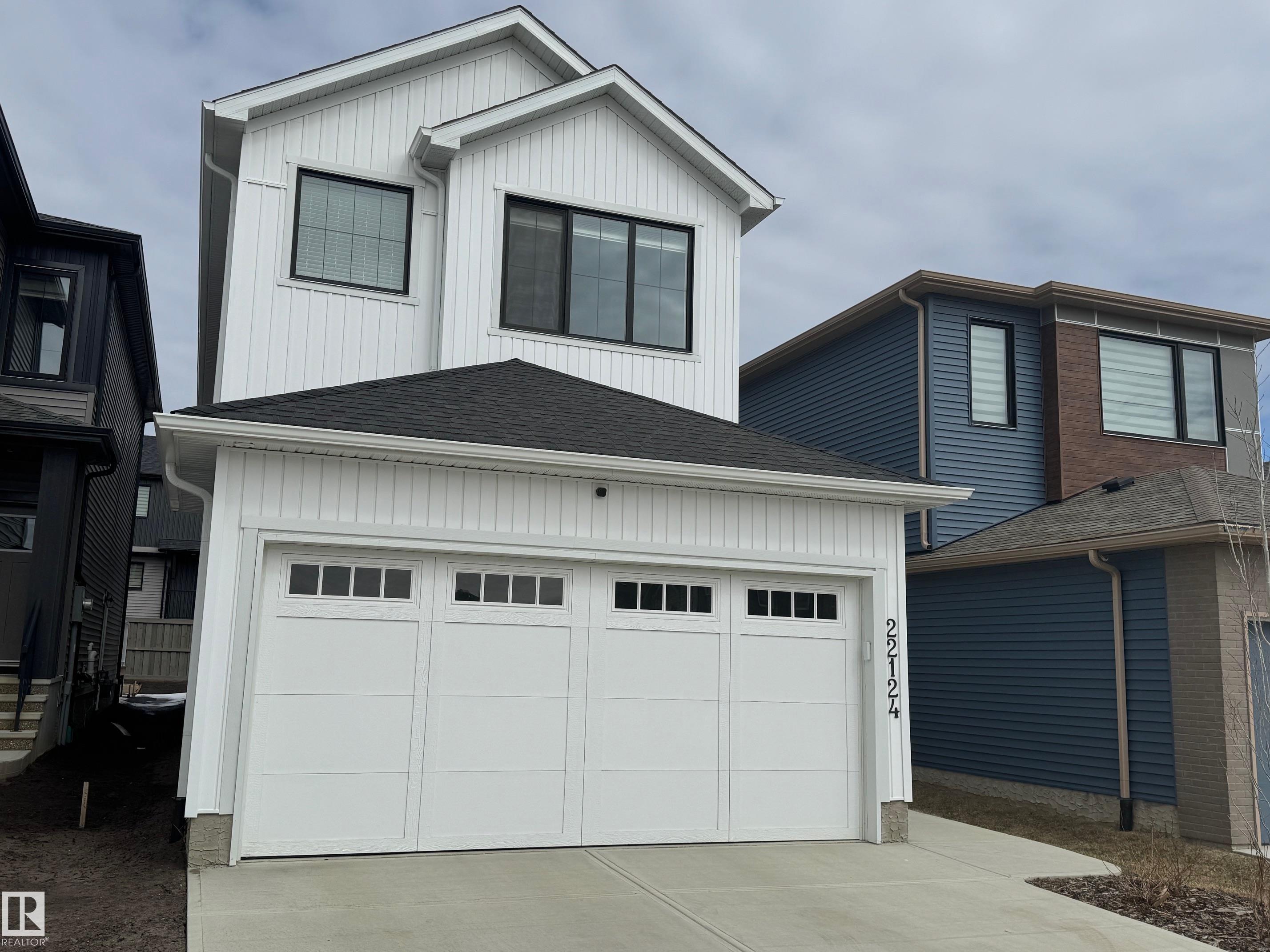 Why buy new when you get a finished basement, a/c & landscaping completed! Over 2525 sq ft of finished living space and absolutely perfect! Lightly lived in & fully finished - this one shows better than new! Complete with a rare & very sought after 4 piece bathroom on the main floor across from the office / bedroom. You will love the flow of this incredible home! Main floor vaulted ceiling allowing an abundance of natural light to the living room, 2 tone cupboard kitchen & dining area on main floor. The 2nd level features 3 very large bedrooms with black out blinds - motorized in primary. An incredible spa ensuite with soaker tub, glass shower & extra large walk in closet. The basement has a large bdrm, 4 piece bath & large living area with storage in mechanical room. Deck with gas line & landscaping done.Close enough to walk your kids to school & to the future Lewis Farms Rec Centre & nearby shops. A double attached garage with extra room for storage. Welcome home to Secord! Some photos virtually staged.