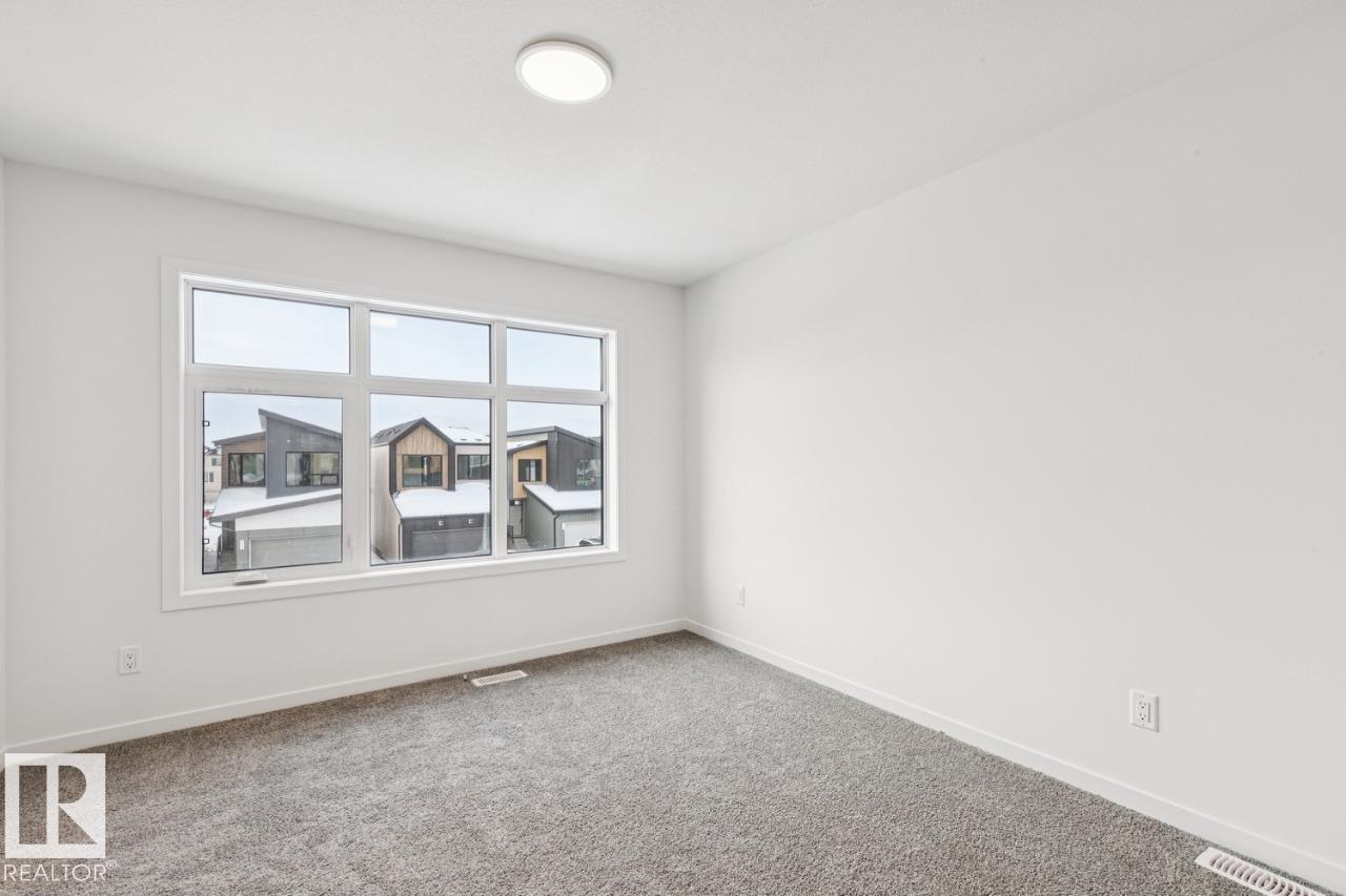 Photo 13 at 327 30 Street SW, Alces, Edmonton