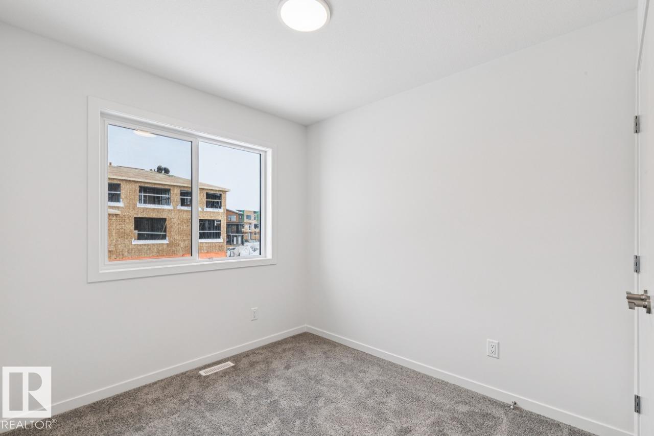 Photo 17 at 327 30 Street SW, Alces, Edmonton