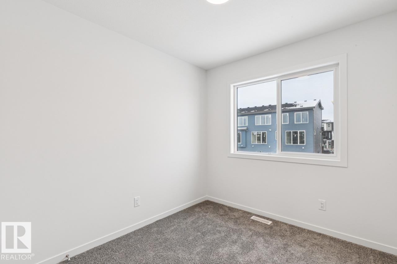 Photo 18 at 327 30 Street SW, Alces, Edmonton