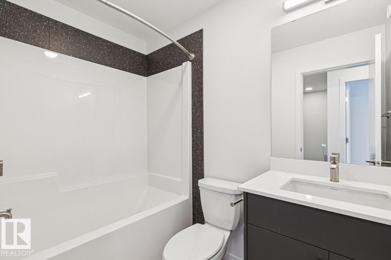 Photo 19 at 327 30 Street SW, Alces, Edmonton