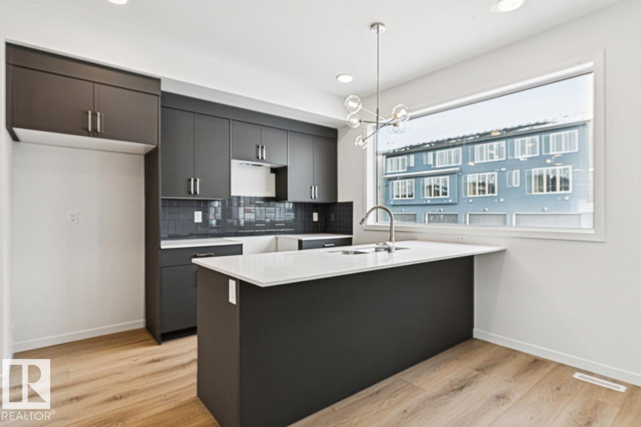 Photo 7 at 327 30 Street SW, Alces, Edmonton