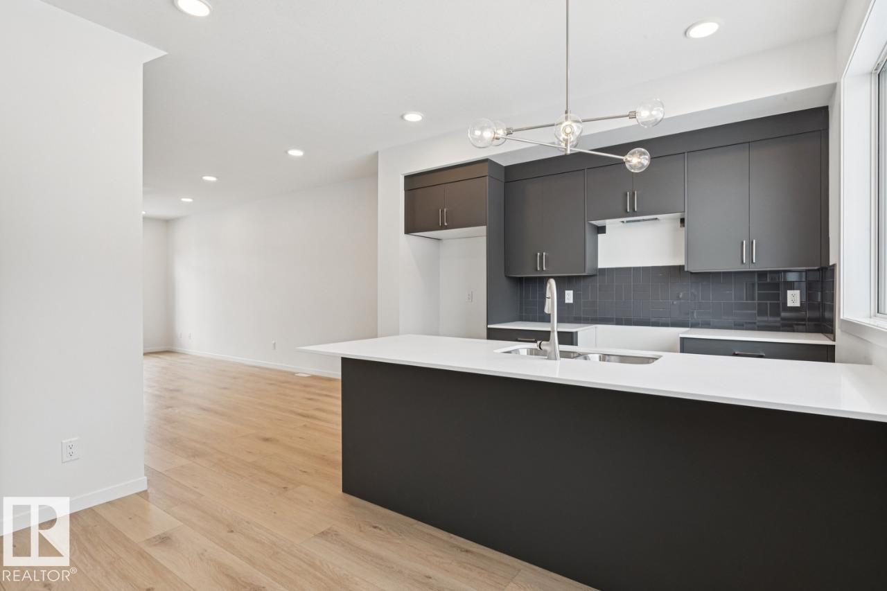 Photo 8 at 327 30 Street SW, Alces, Edmonton