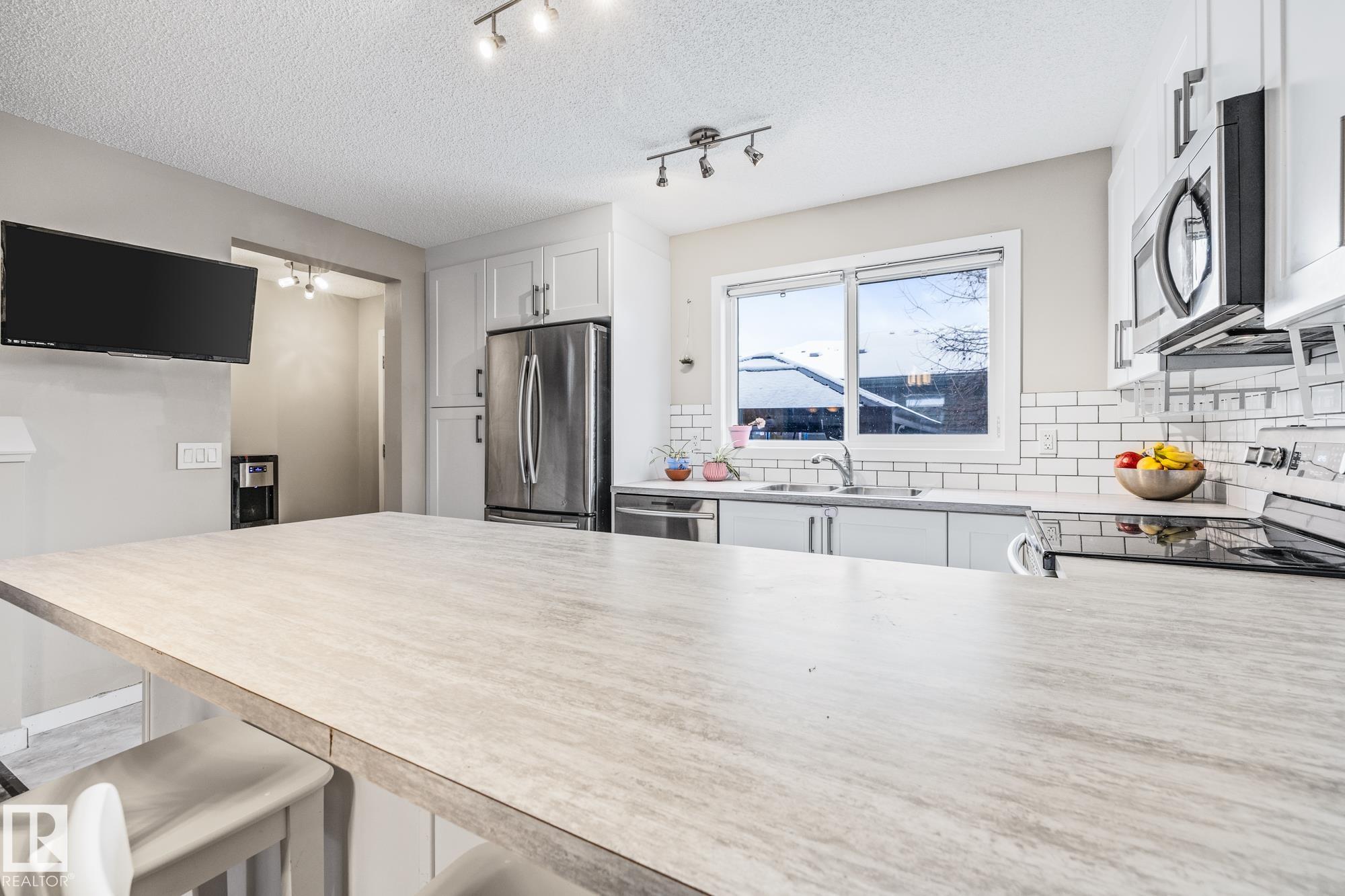 Photo 4 at 384 Charlesworth Drive SW, Charlesworth, Edmonton