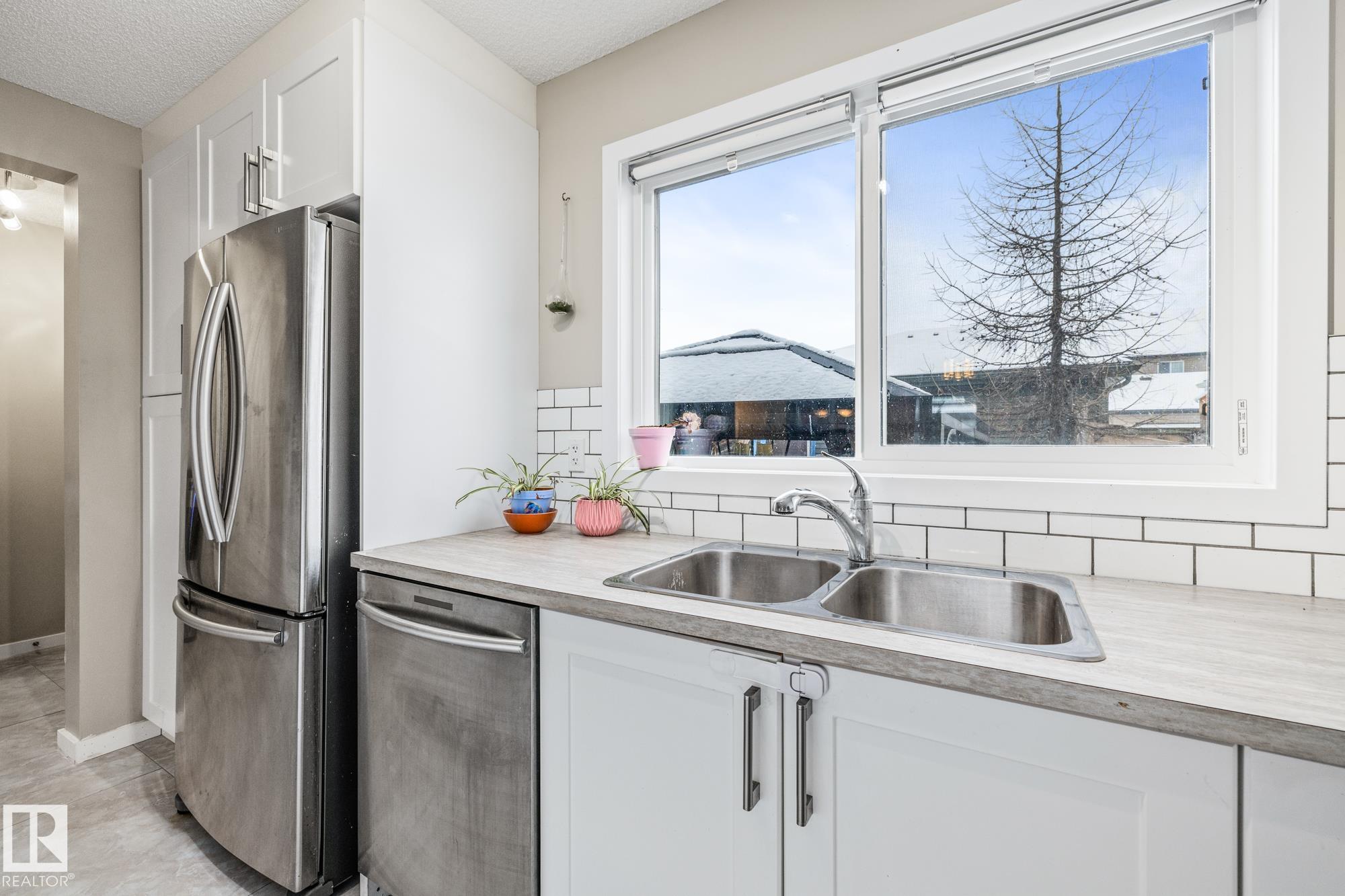 Photo 9 at 384 Charlesworth Drive SW, Charlesworth, Edmonton