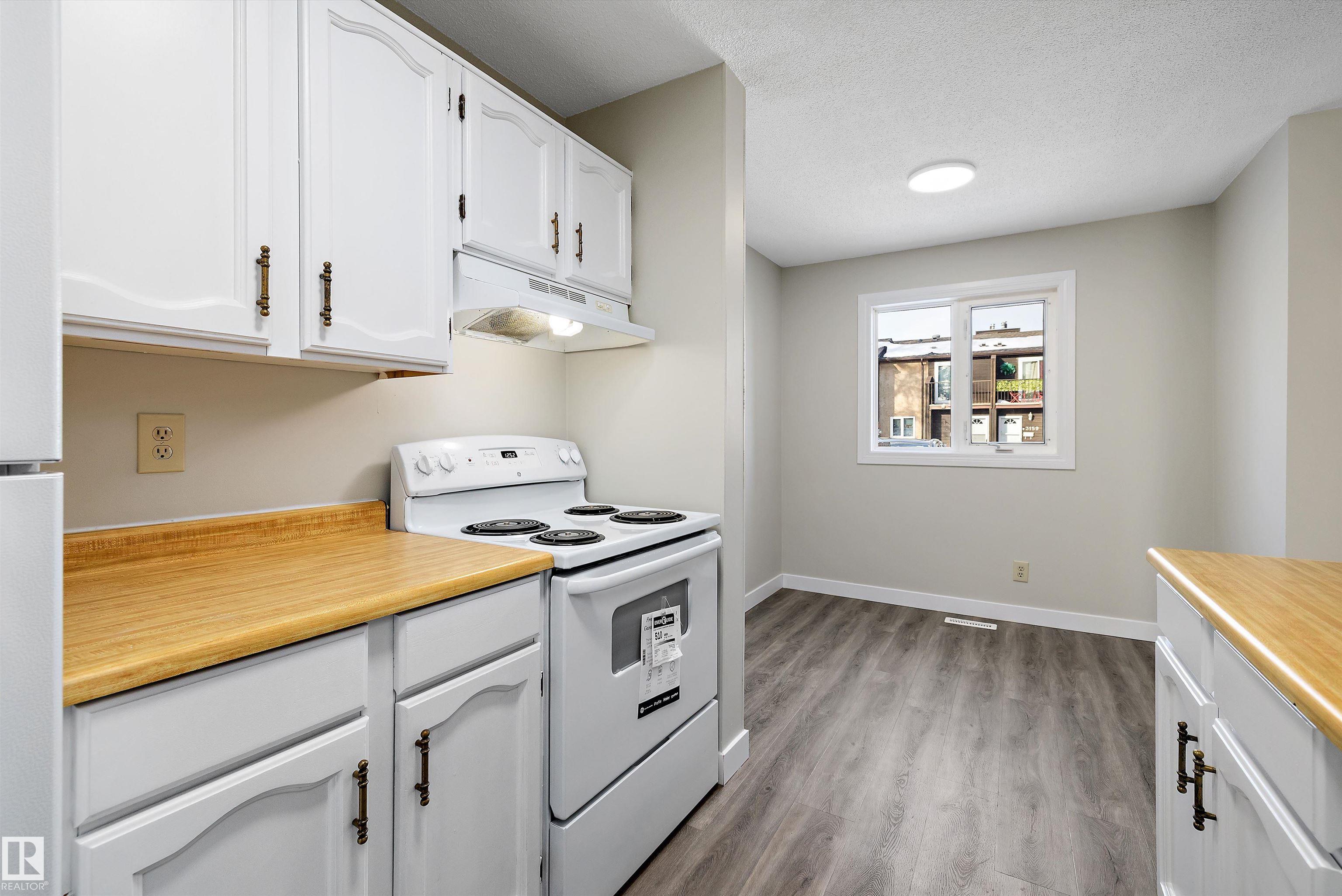 Photo 11 at 3127 139 Avenue NW, Hairsine, Edmonton