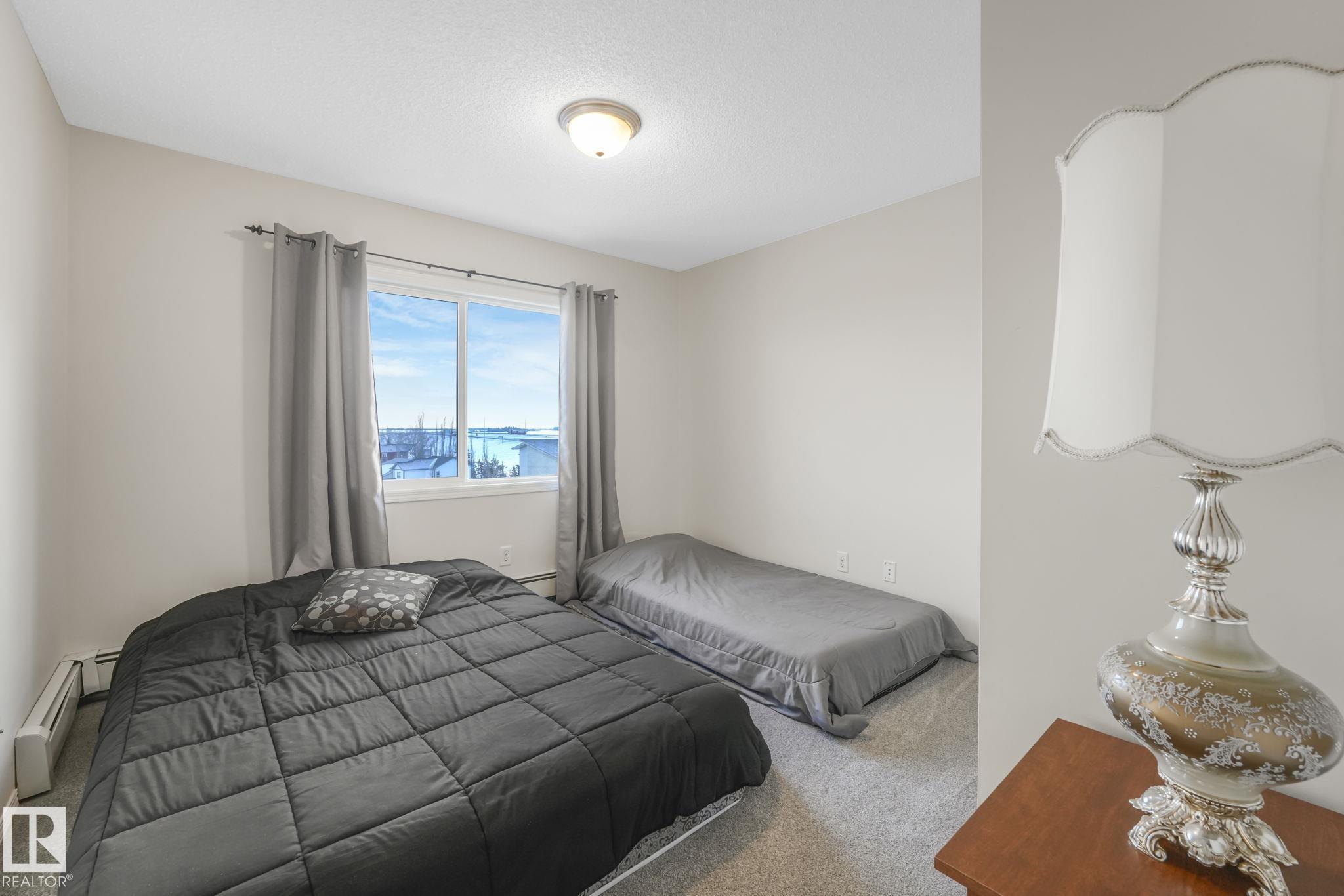 Photo 35 at 504 - 9910 107 Street NW, Morinville