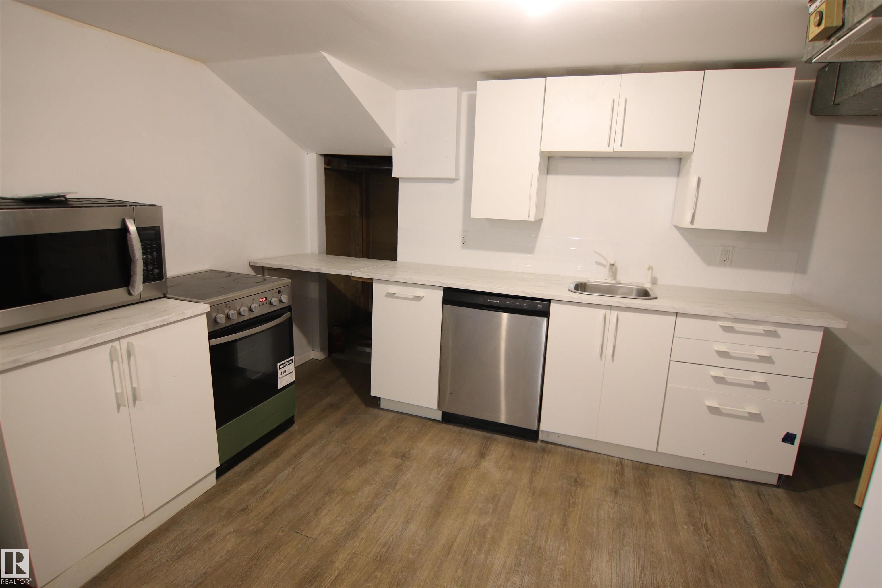 Photo 16 at 11161 67 Street NW, Highlands, Edmonton