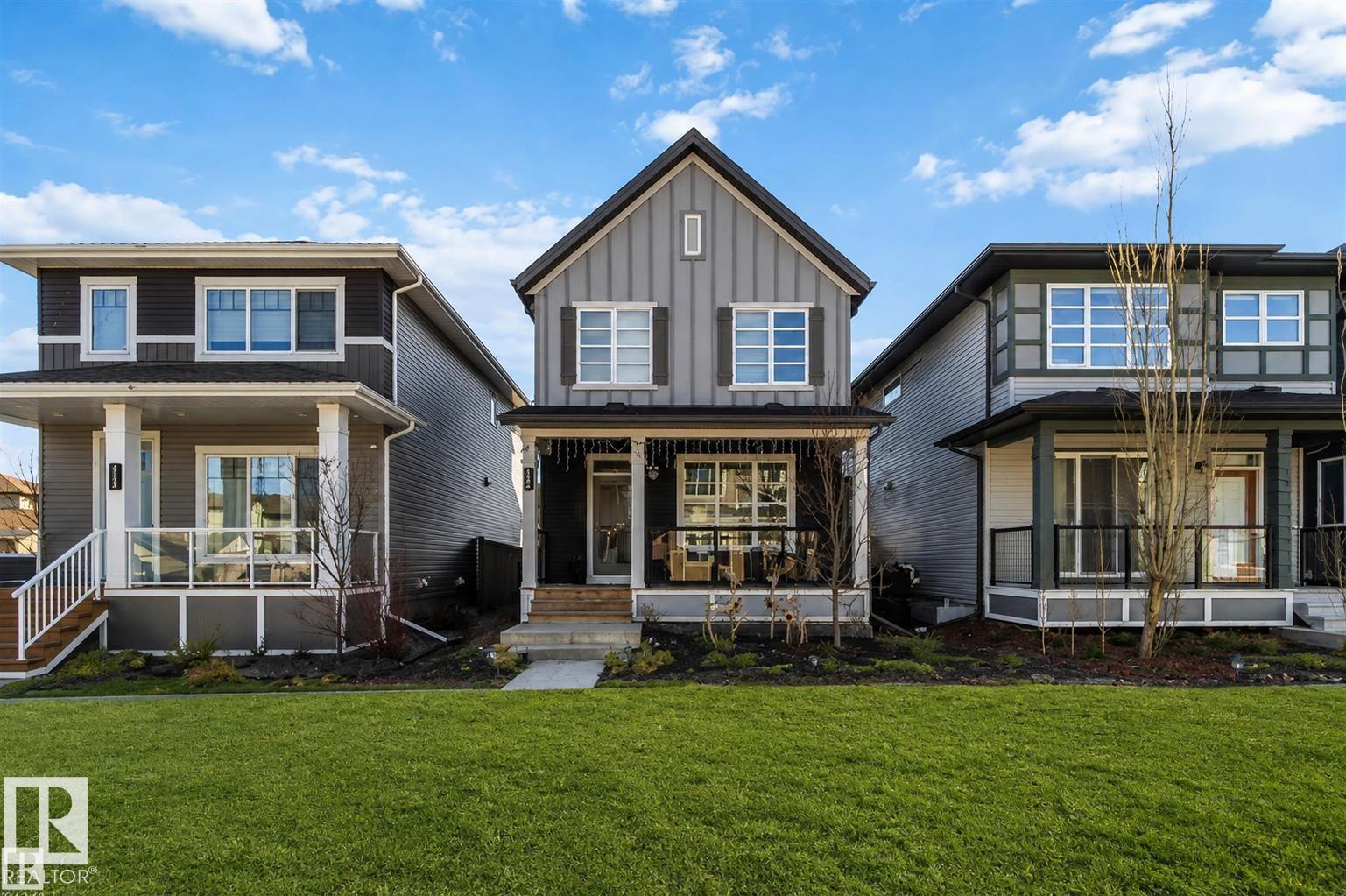 This former Homes by Avi showhome sits on a premium greenspace lot in the sought-after community of Laurel Green, offering style, space, and privacy in one exceptional package.  The home features 3 spacious bedrooms, 2.5 bathrooms, and a bright, open main floor with 9? ceilings and luxurious vinyl plank flooring throughout. The chef-inspired kitchen is finished with quartz countertops and a stainless steel appliance package, perfect for both everyday living and entertaining. Outside, enjoy the convenience of a double detached garage, full professional landscaping, and complete fencing?everything already done, just move in and enjoy. home has central air.