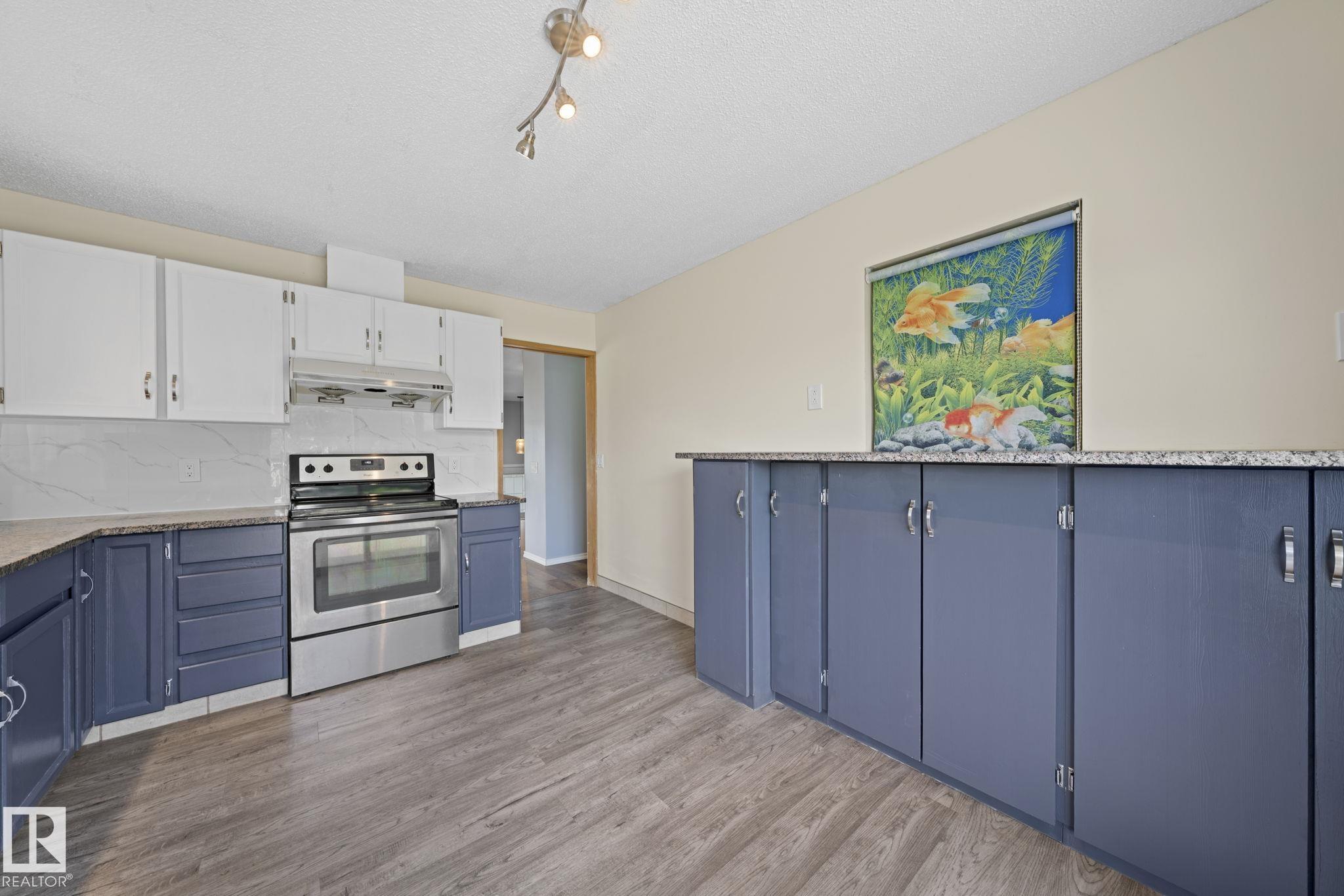 Photo 16 at 10458 14 Avenue NW, Bearspaw, Edmonton