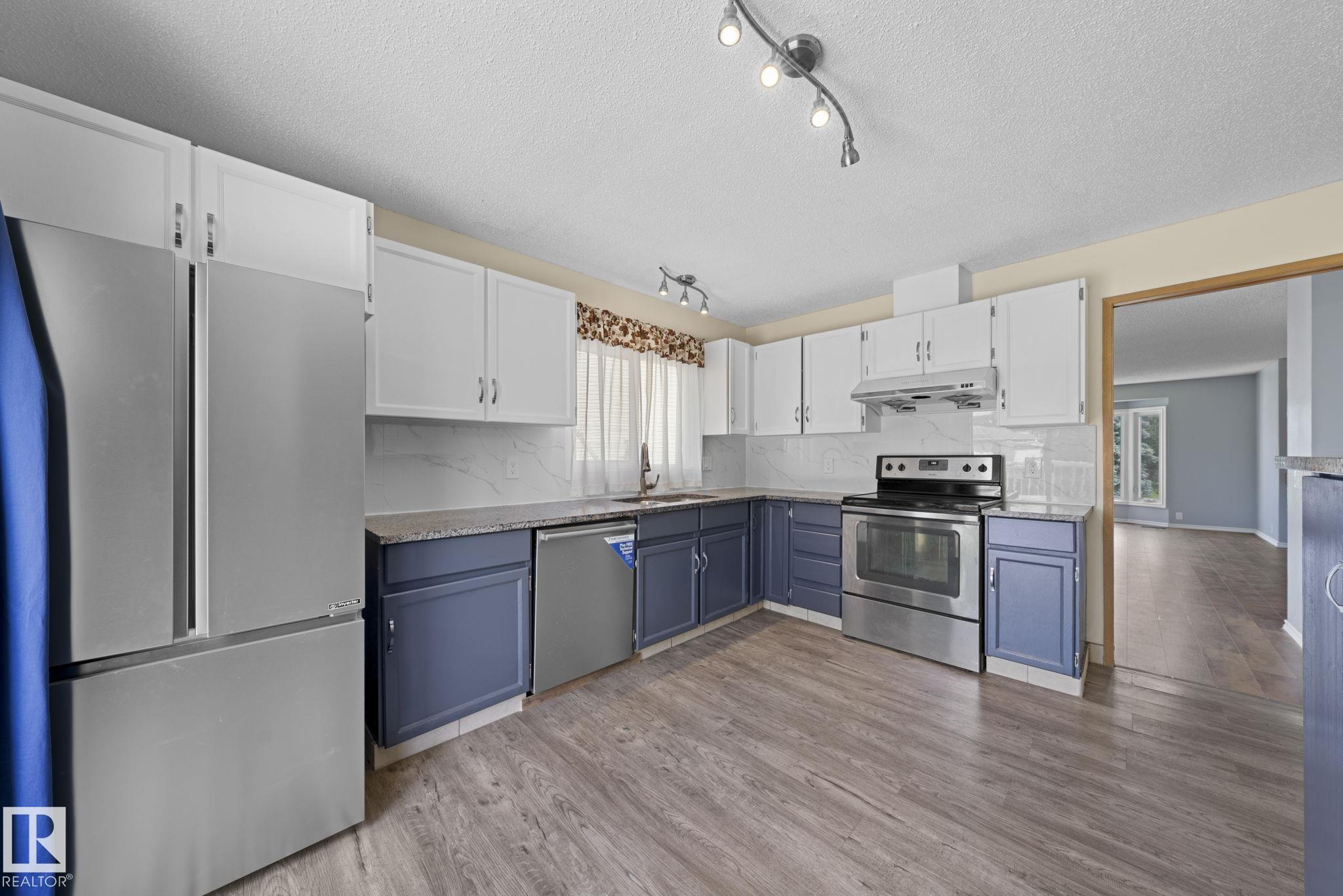 Photo 17 at 10458 14 Avenue NW, Bearspaw, Edmonton